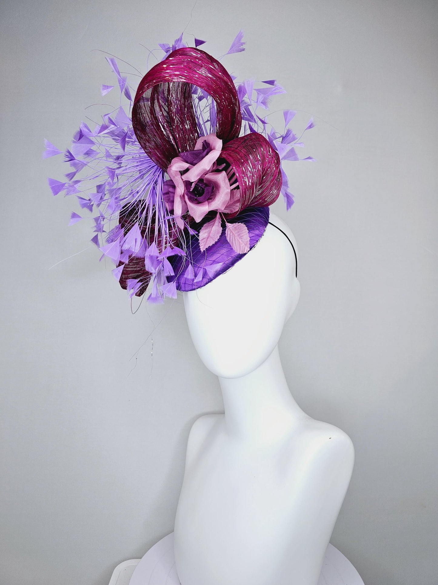 kentucky derby hat fascinator purple satin with branching purple feathers,dusty pink silk flowers leaves,with mulberry purple metallic silk