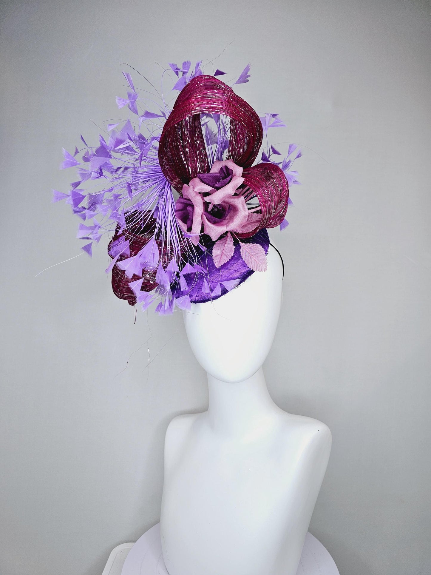 kentucky derby hat fascinator purple satin with branching purple feathers,dusty pink silk flowers leaves,with mulberry purple metallic silk