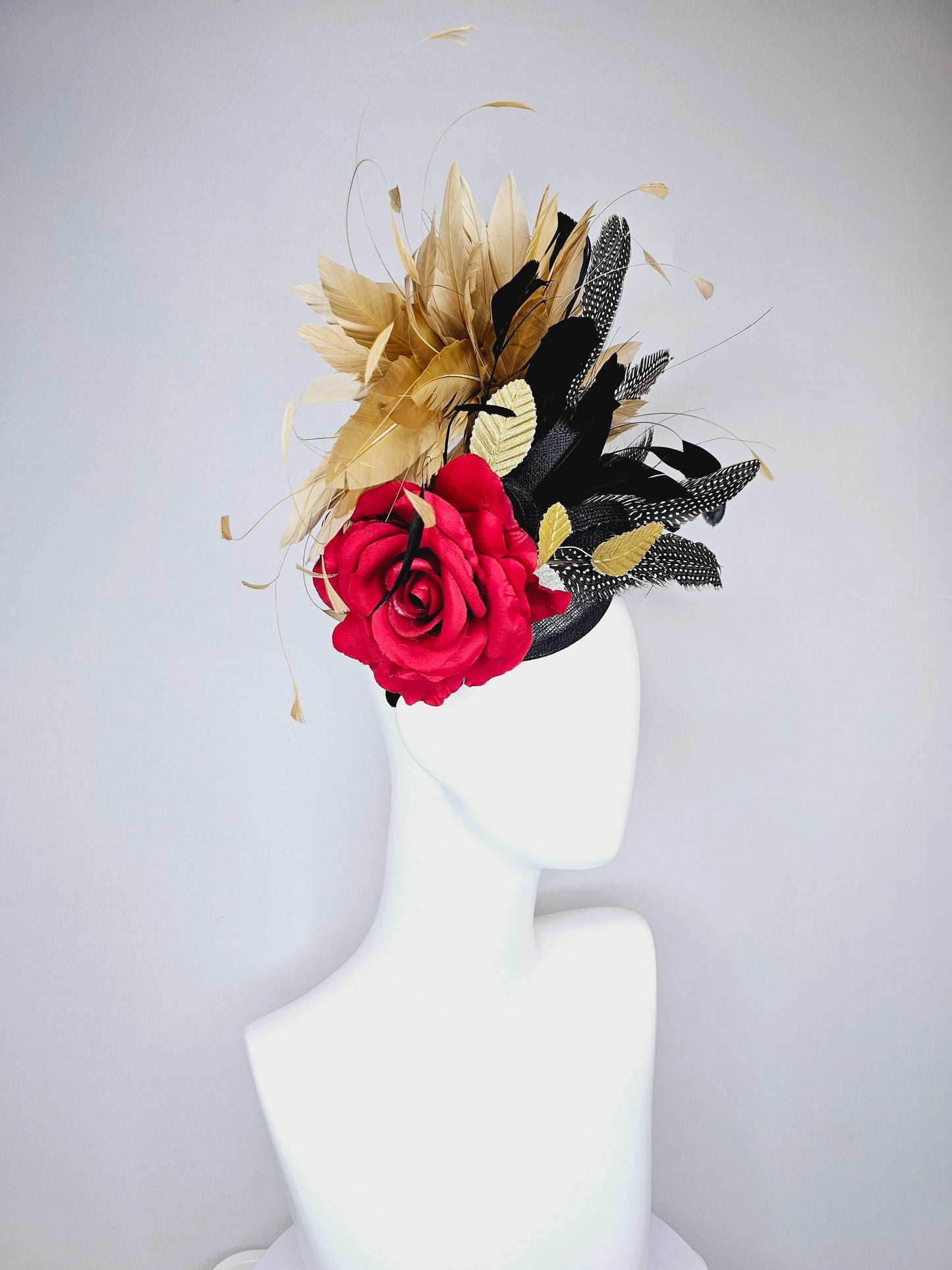 kentucky derby hat fascinator black sinamay base with red rose and beige tan and black feathers,bright gold leaves, with pheasant feathers