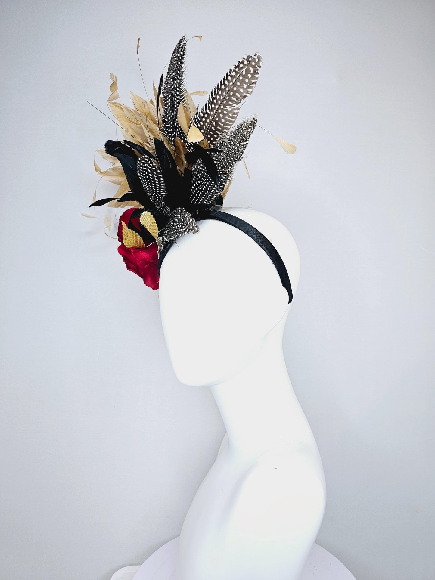 kentucky derby hat fascinator black sinamay base with red rose and beige tan and black feathers,bright gold leaves, with pheasant feathers