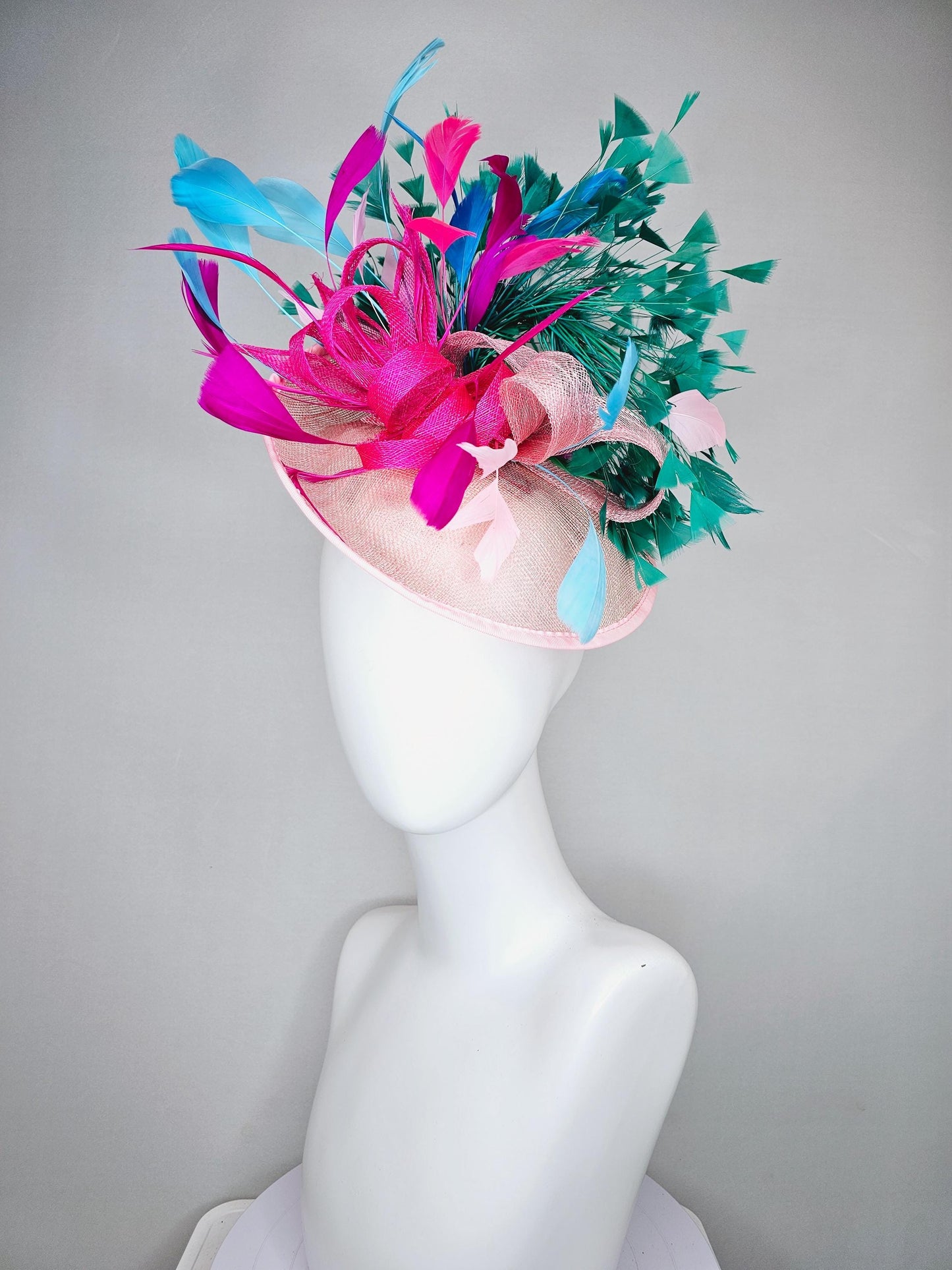 kentucky derby hat fascinator light pink sinamay saucer with curls and with colorful bright fuchsia hot pink,green, blue branching feathers