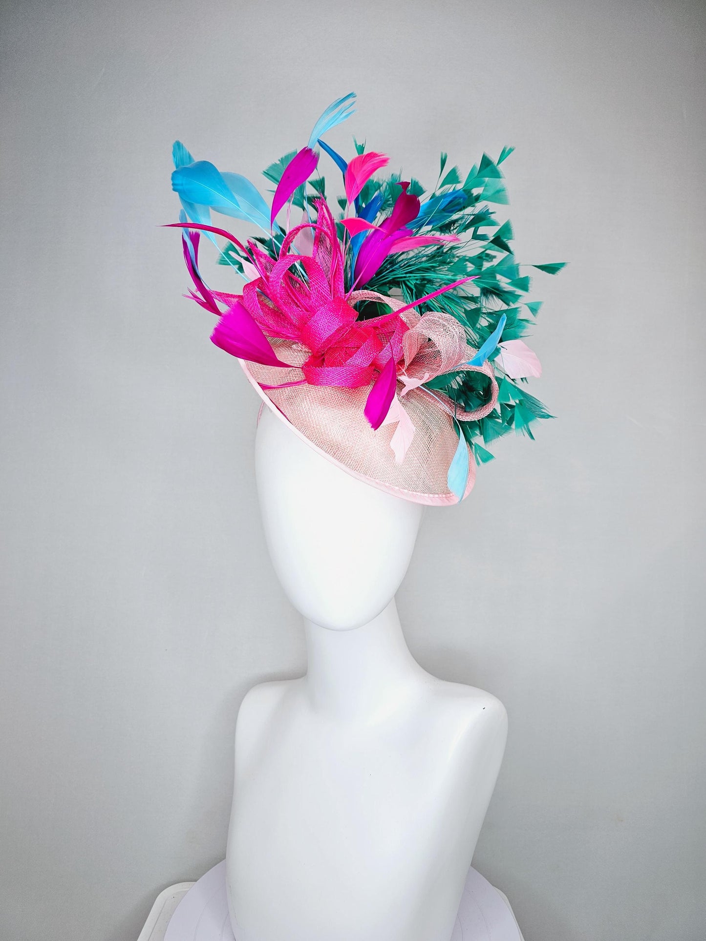 kentucky derby hat fascinator light pink sinamay saucer with curls and with colorful bright fuchsia hot pink,green, blue branching feathers