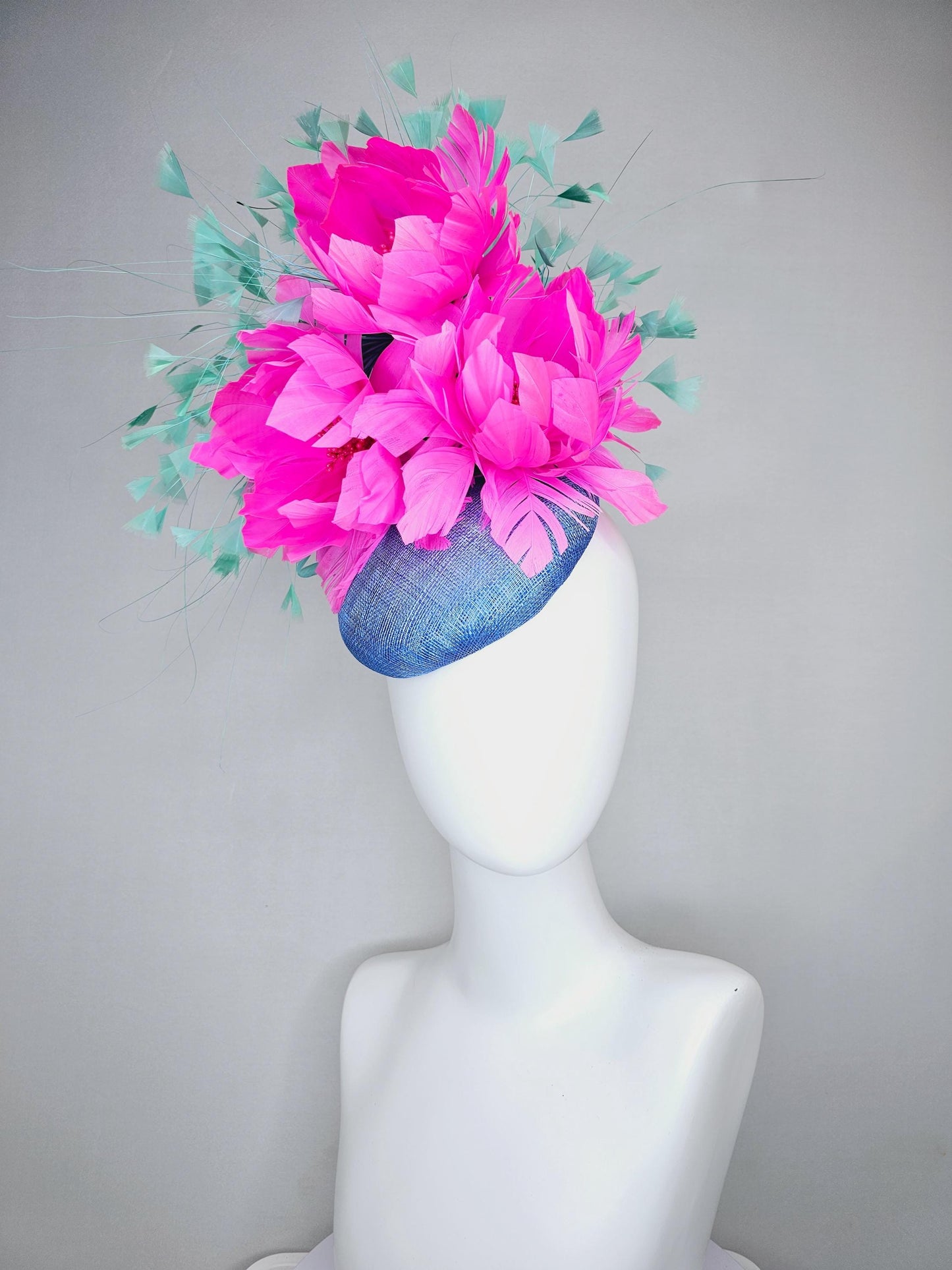 kentucky derby hat fascinator blue sinamay saucer with bright fuchsia hot pink feather flowers and mint green branching feathers