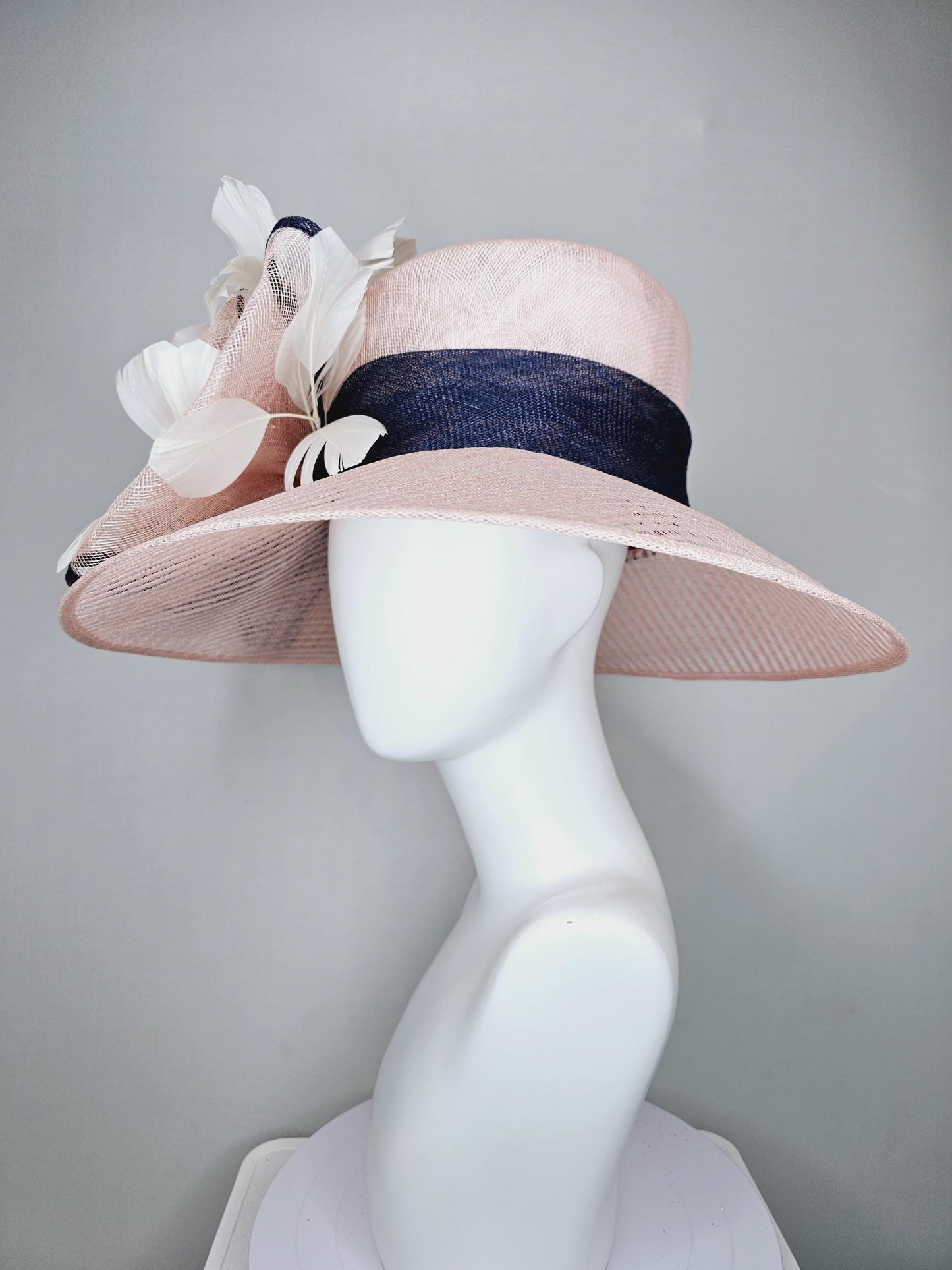 kentucky derby hat wide brim light dusty pink sinamay with light pink silk satin rose,black sinamay details and ivory branching feather