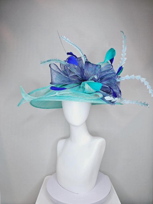 kentucky derby hat wide brim sinamay in teal blue turquoise with large royal blue sinamay bow and light blue and royal blue feathers