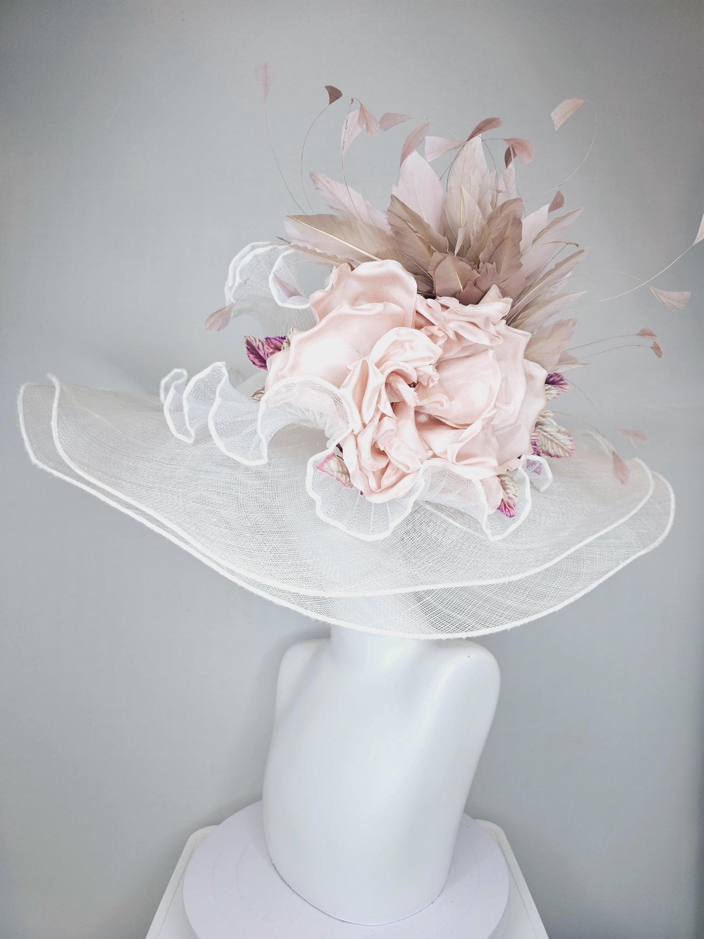 kentucky derby wide brim white ivory sinamay hat with large champagne blush rose silk satin flower,beige tan feathers and purple tan leaves