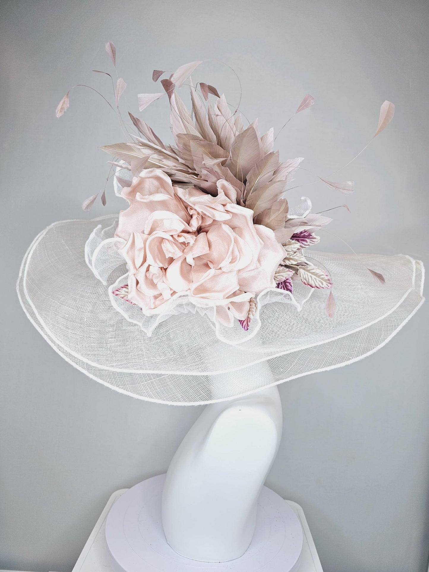 kentucky derby wide brim white ivory sinamay hat with large champagne blush rose silk satin flower,beige tan feathers and purple tan leaves