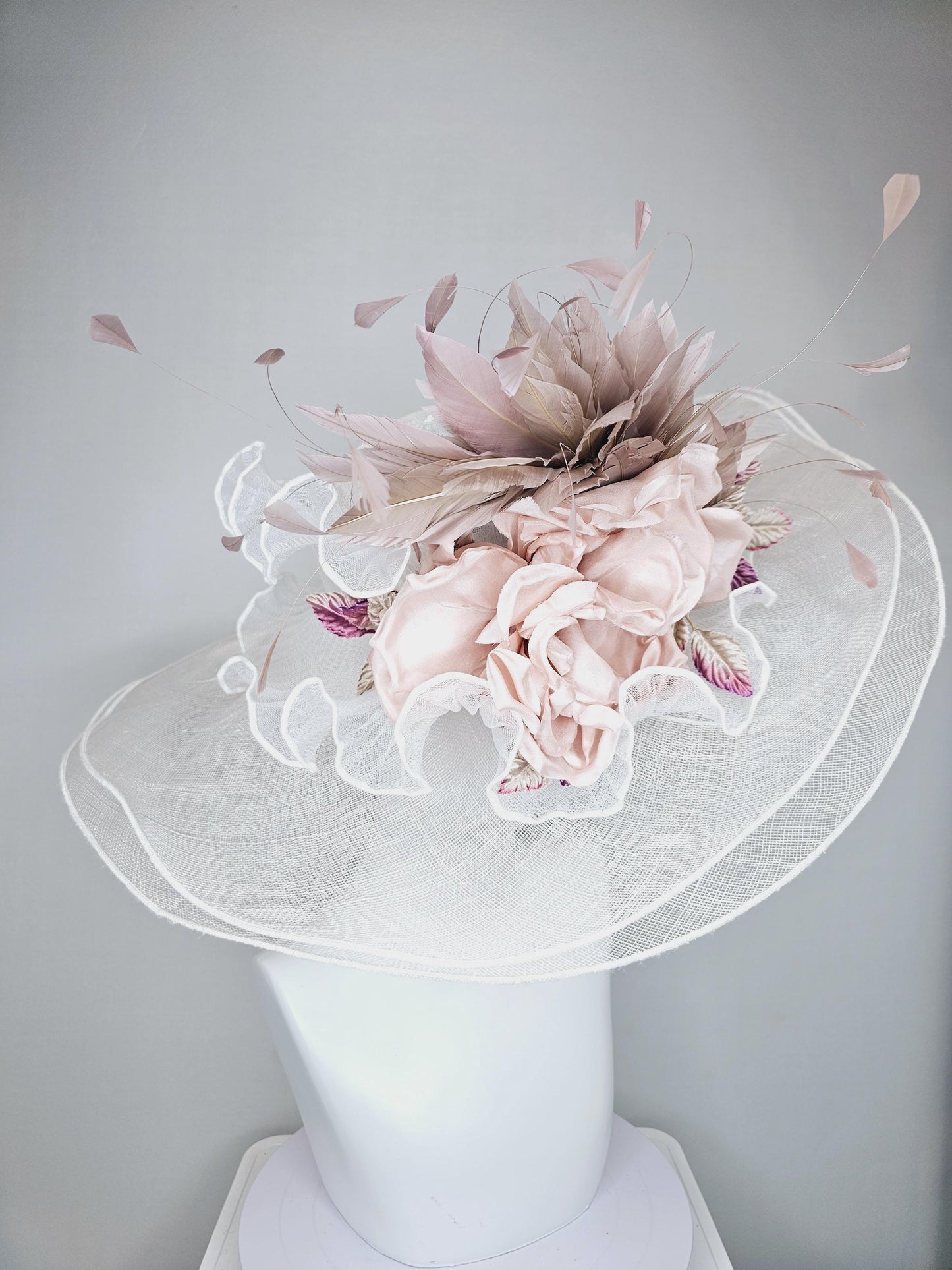 kentucky derby wide brim white ivory sinamay hat with large champagne blush rose silk satin flower,beige tan feathers and purple tan leaves