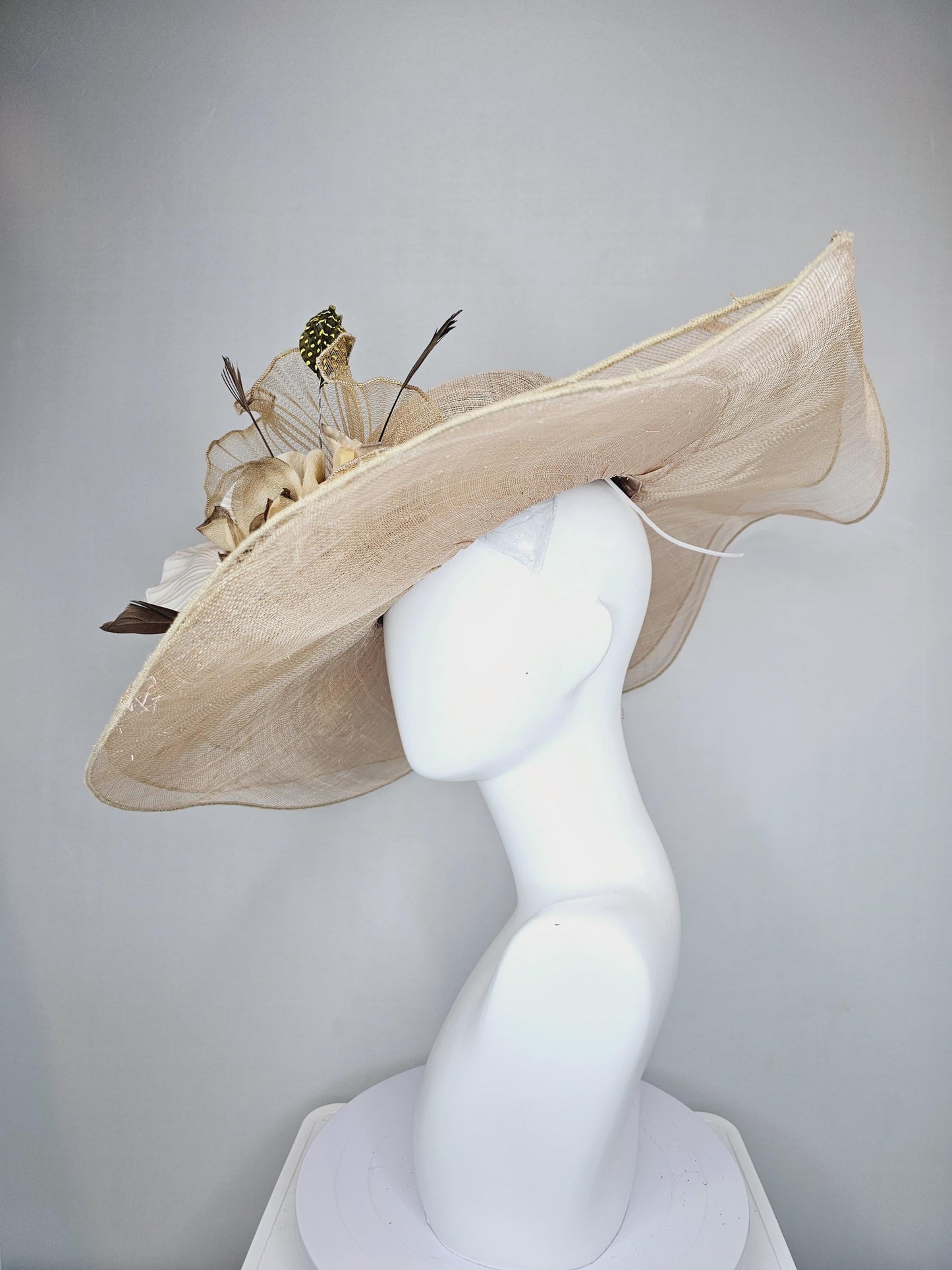 kentucky derby hat gold tan beige wide brim sinamay with gold brown silk satin flowers,white silk pleated details,brown and tan feathers