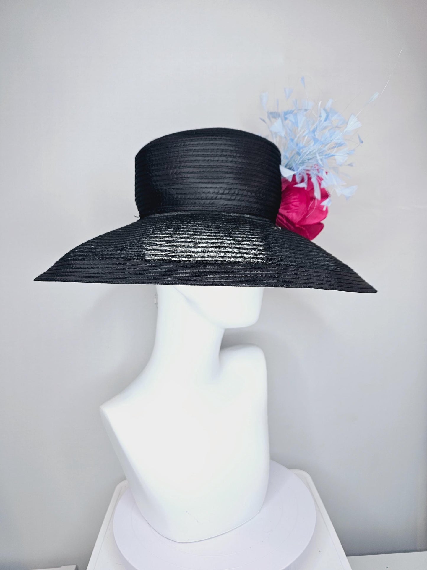 kentucky derby hat fascinator black sinamay wide brim with hot pink silk satin flower with pearl core and light baby blue branching feathers