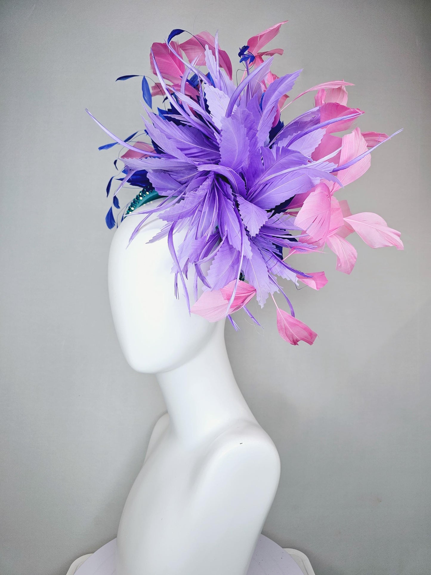 kentucky derby hat fascinator branching pink,royal blue,and purple lavender feathers on iridescent Swarovski crystal turquoise blue headband