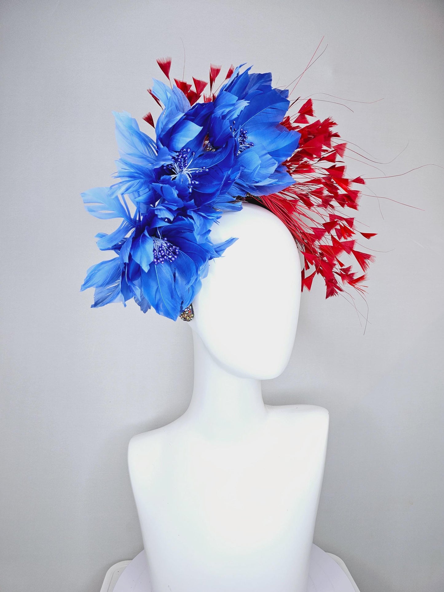 kentucky derby hat fascinator rainbow colorful crystal rhinestone headband with cobalt royal blue feather flowers and branching red feathers