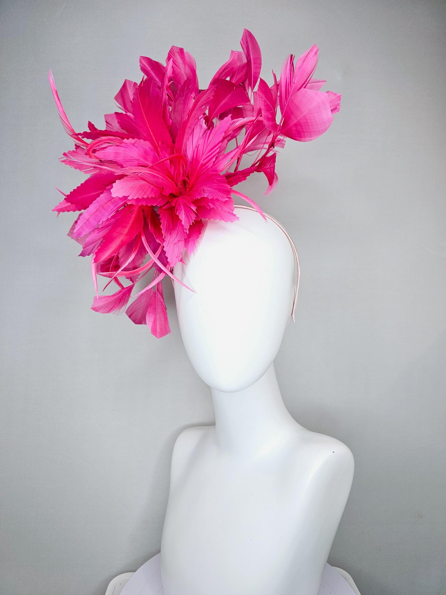 kentucky derby hat fascinator with bright hot pink branching feathers