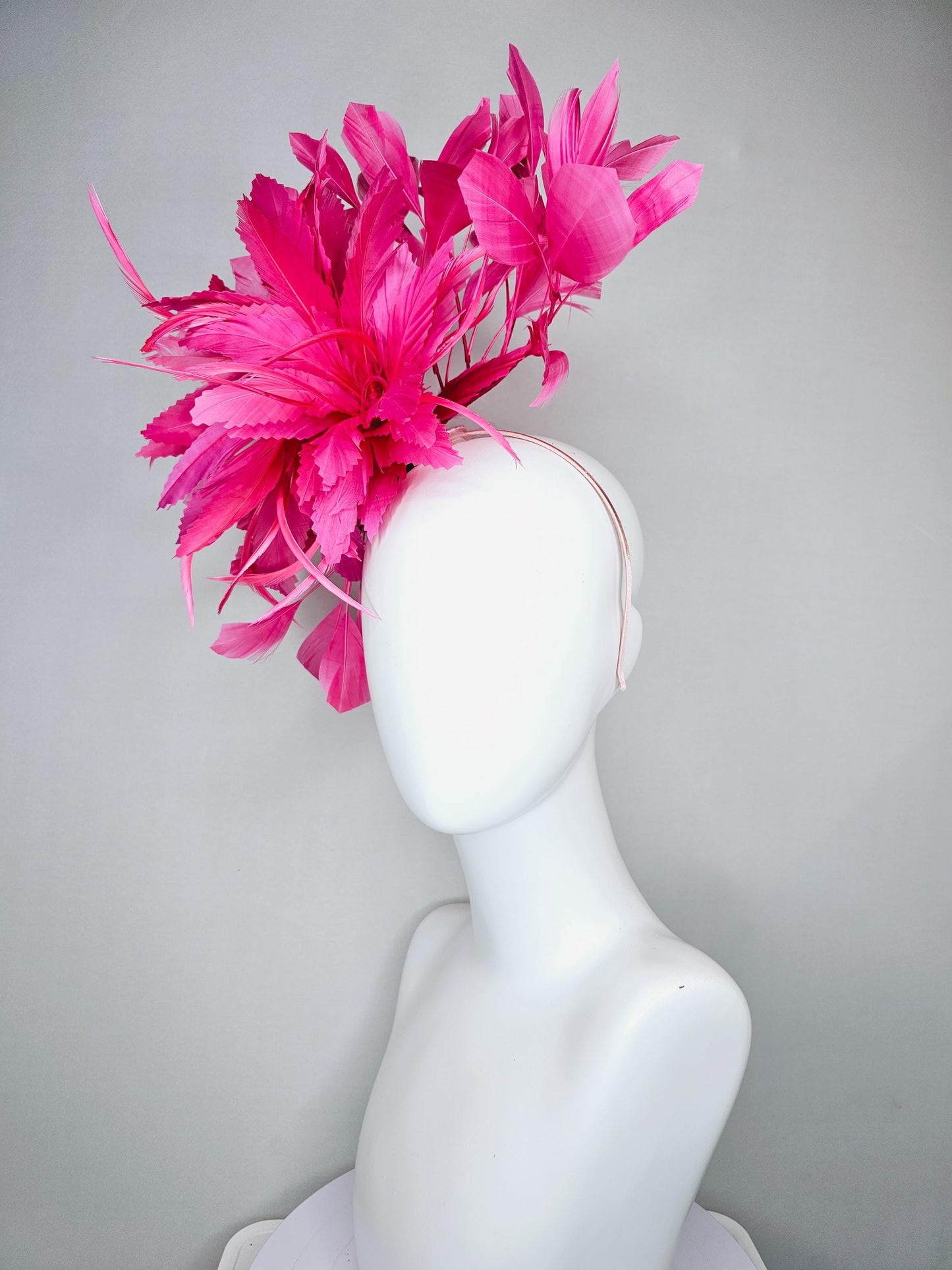 kentucky derby hat fascinator with bright hot pink branching feathers