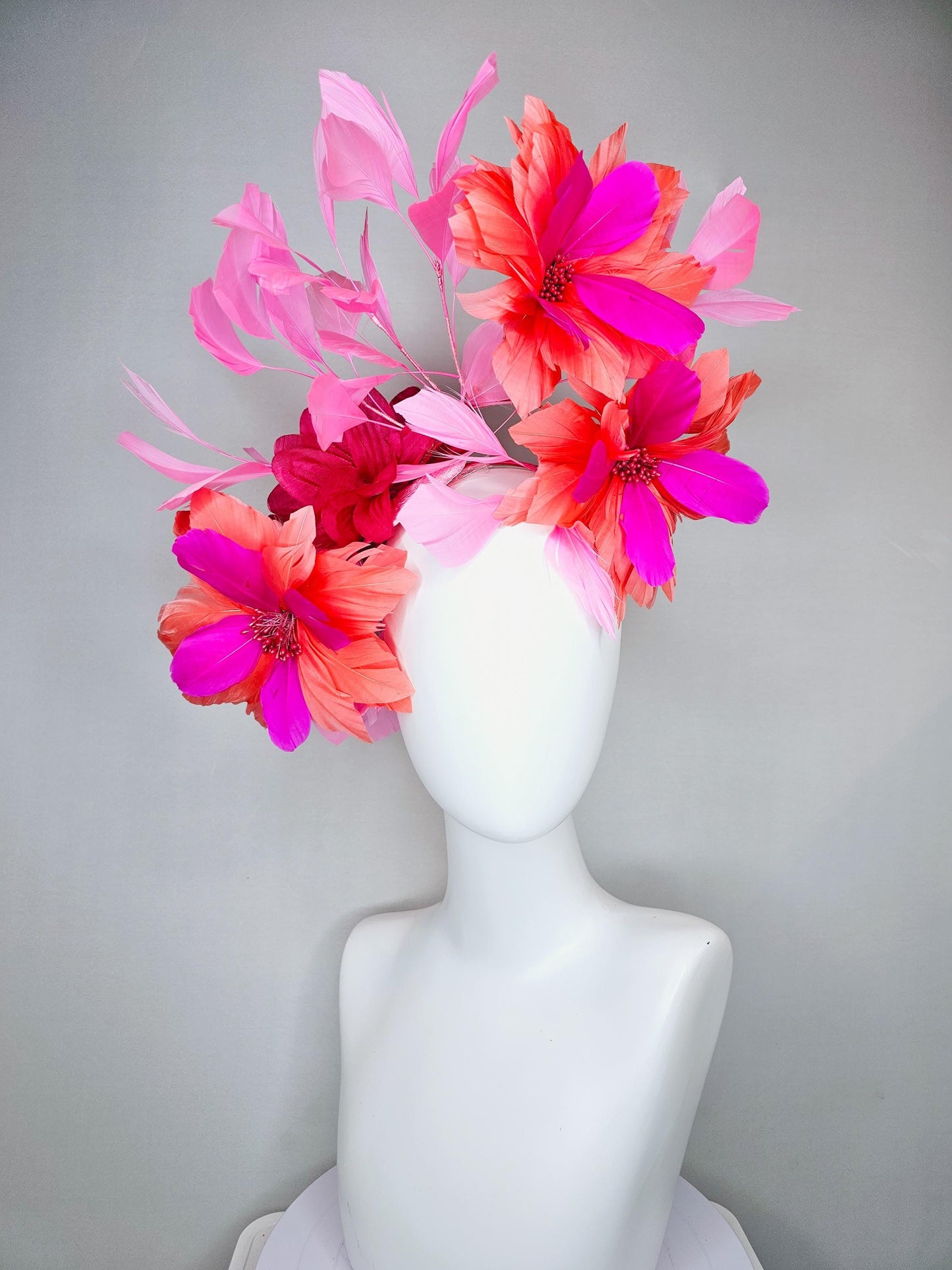 kentucky derby hat fascinator with fuchsia pink and coral orange feather flowers,and light pink branching feathers