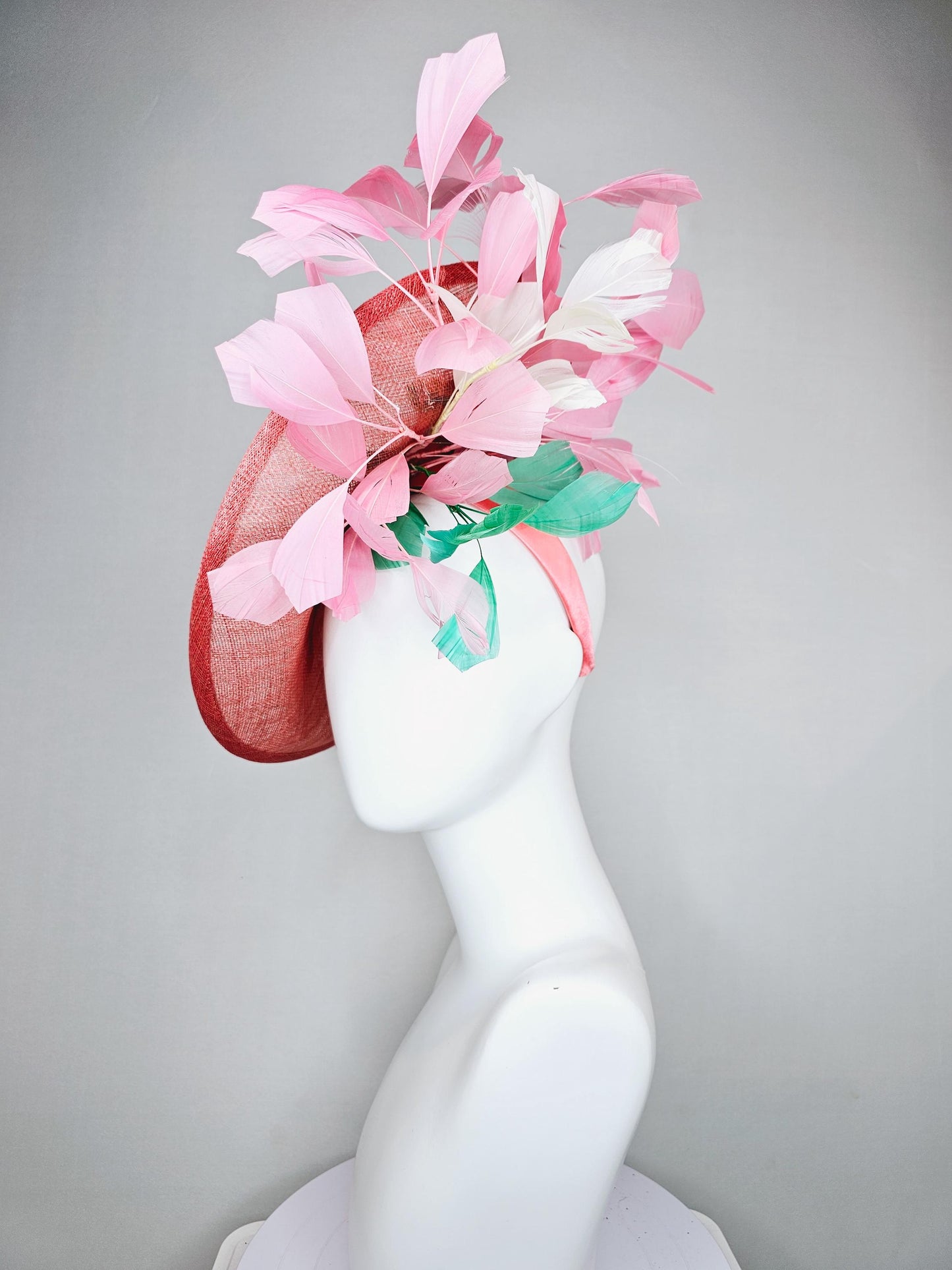 kentucky derby hat fascinator coral peach sinamay saucer with pink green brown floral embroidery,light pink and green branching feathers