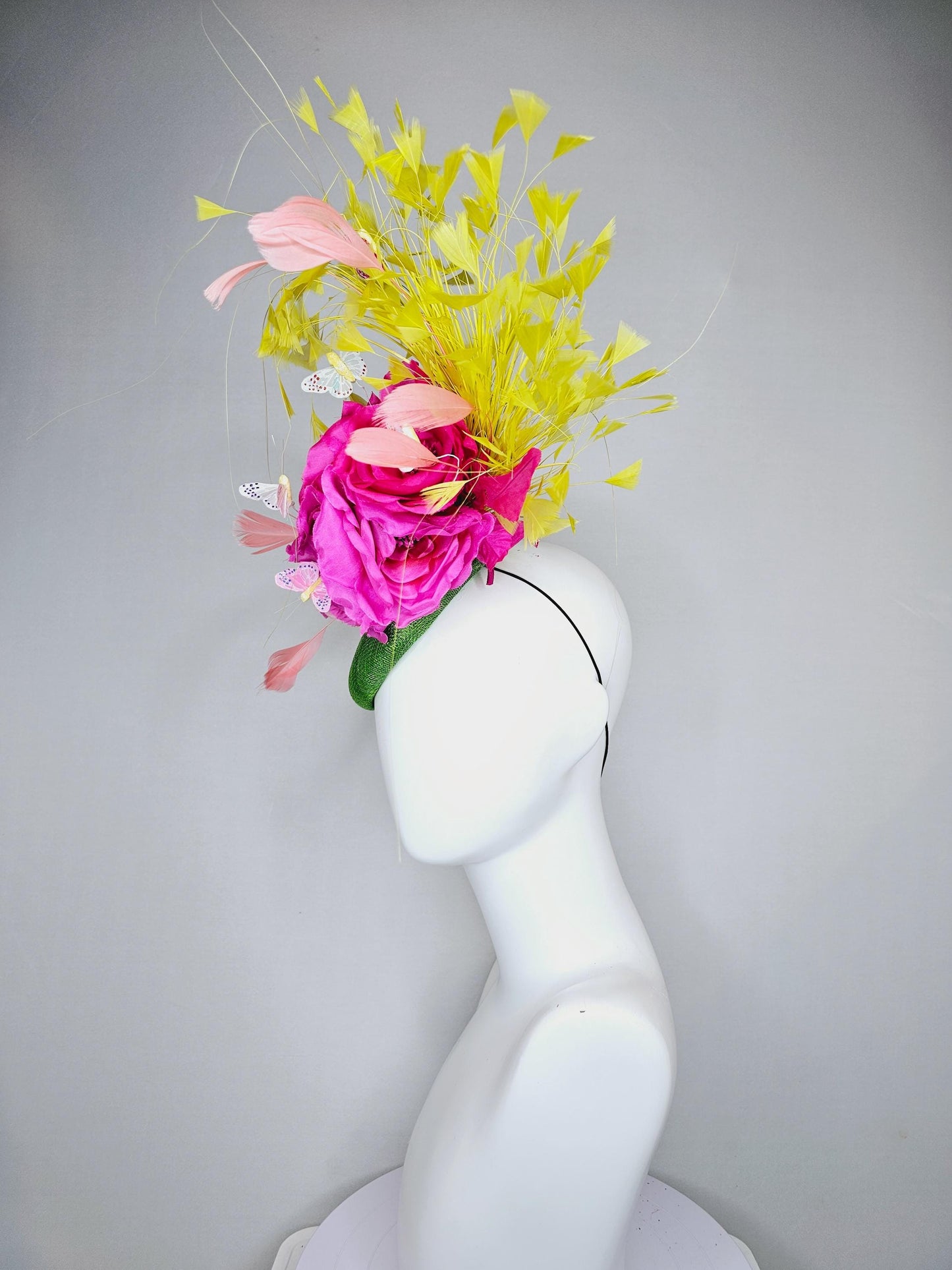 kentucky derby hat fascinator green sinamay, fuchsia pink silk organza flowers, yellow branching feathers and white butterflies