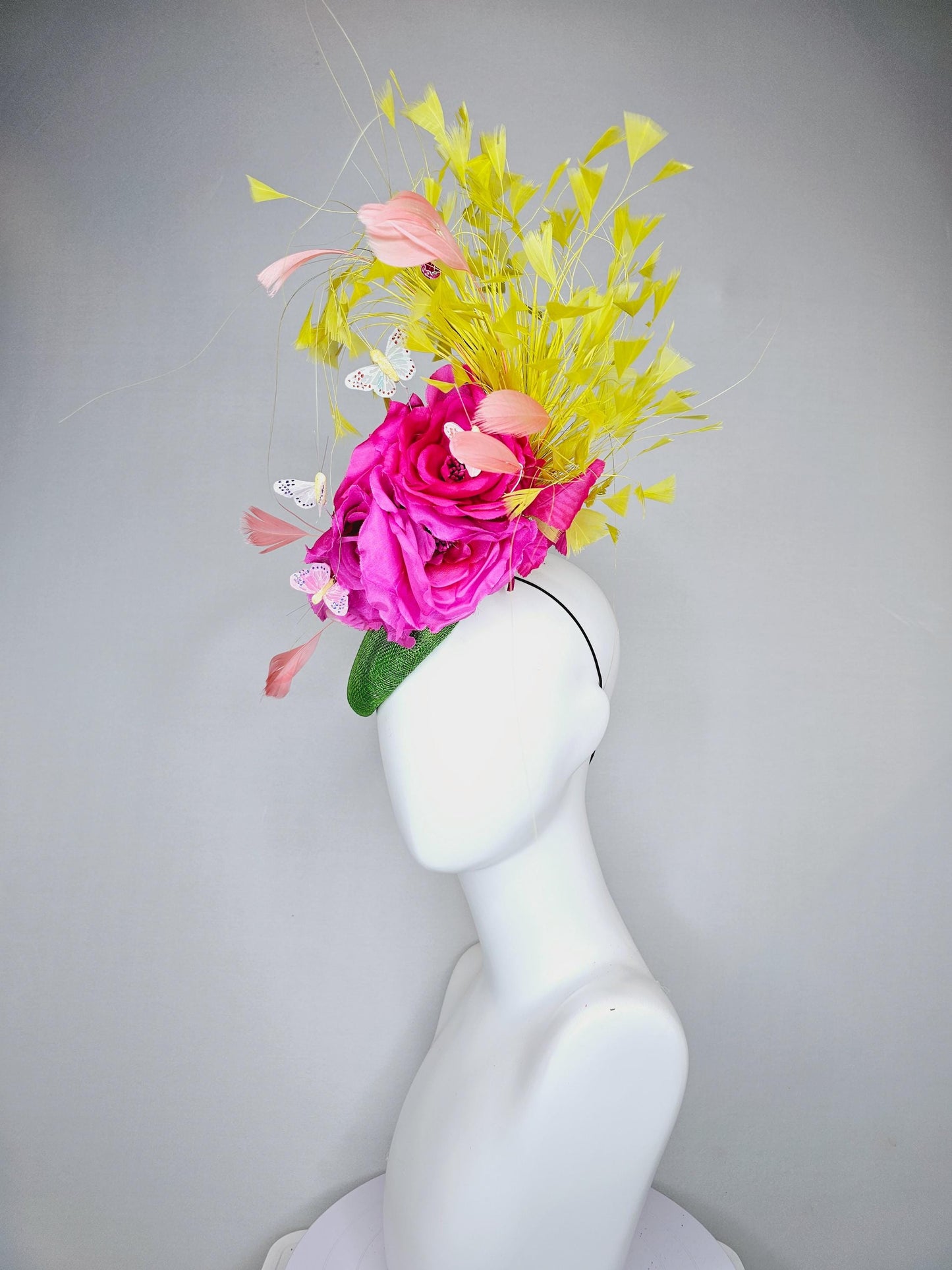 kentucky derby hat fascinator green sinamay, fuchsia pink silk organza flowers, yellow branching feathers and white butterflies