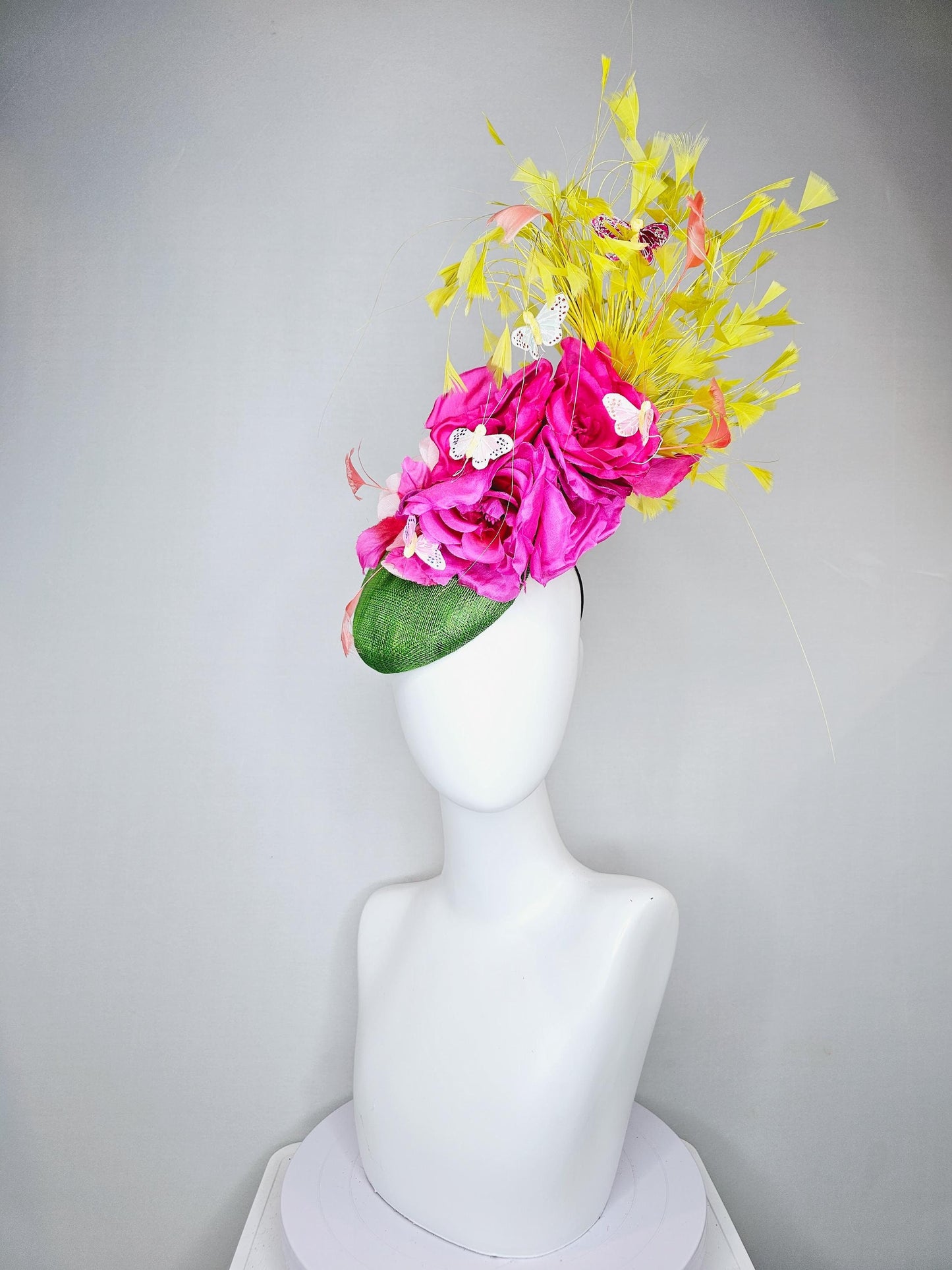 kentucky derby hat fascinator green sinamay, fuchsia pink silk organza flowers, yellow branching feathers and white butterflies