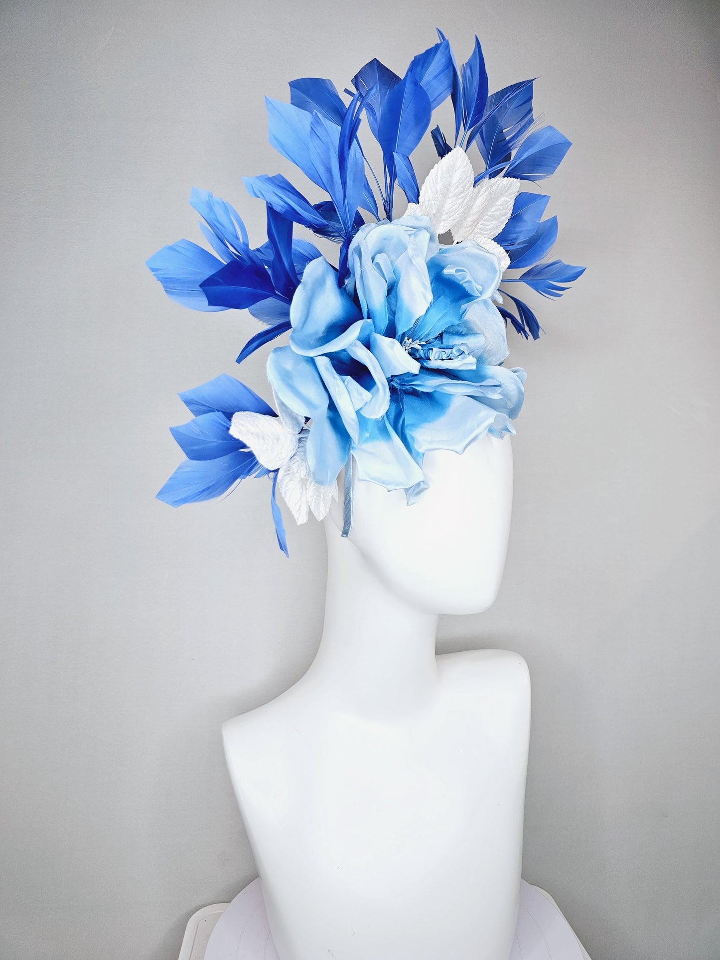 kentucky derby hat fascinator sky light blue satin silk flowers with white satin leaves and cobalt royal blue branching feathers