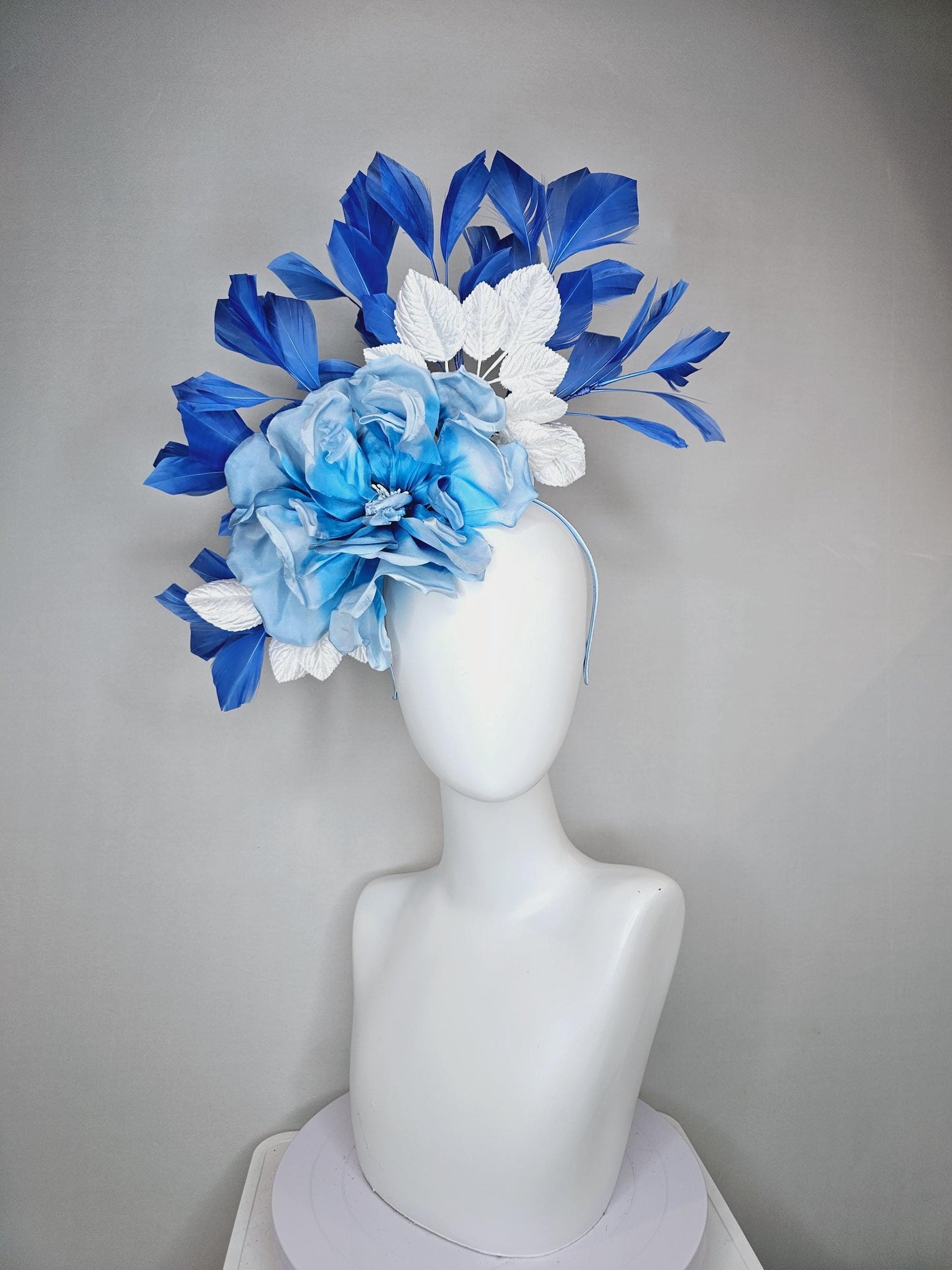 kentucky derby hat fascinator sky light blue satin silk flowers with white satin leaves and cobalt royal blue branching feathers