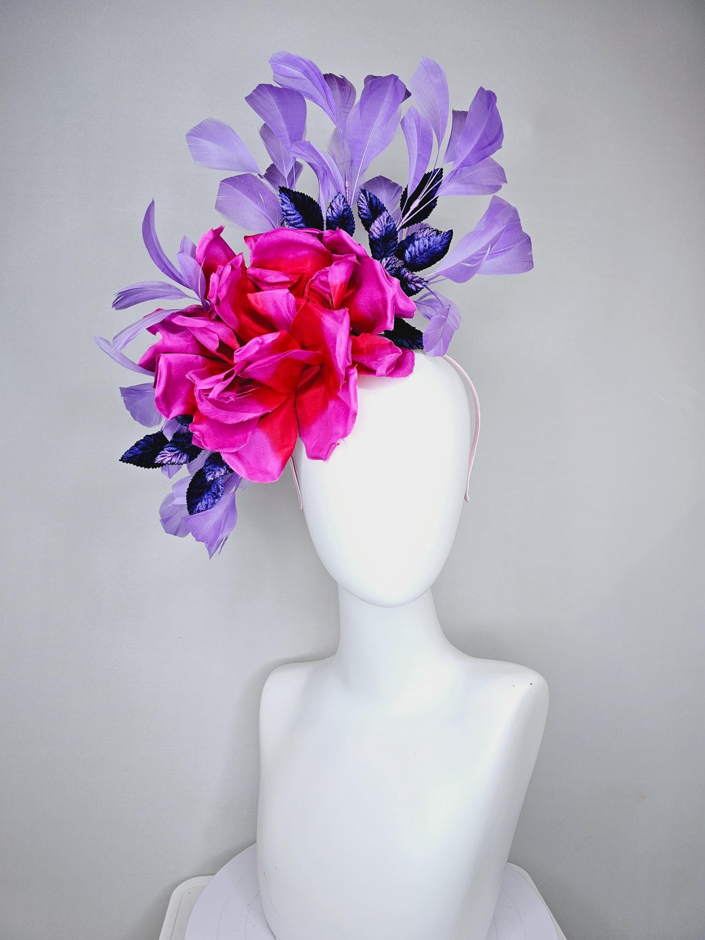 kentucky derby hat fascinator bright pink fuchsia red satin silk flower, purple violet satin leaves and purple lavender branching feathers