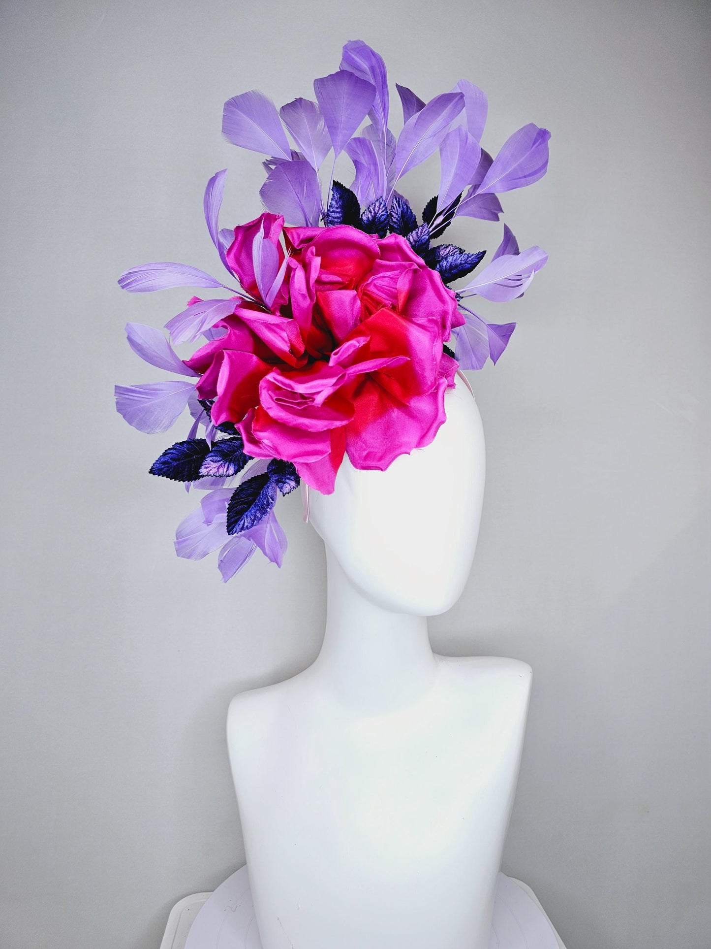 kentucky derby hat fascinator bright pink fuchsia red satin silk flower, purple violet satin leaves and purple lavender branching feathers