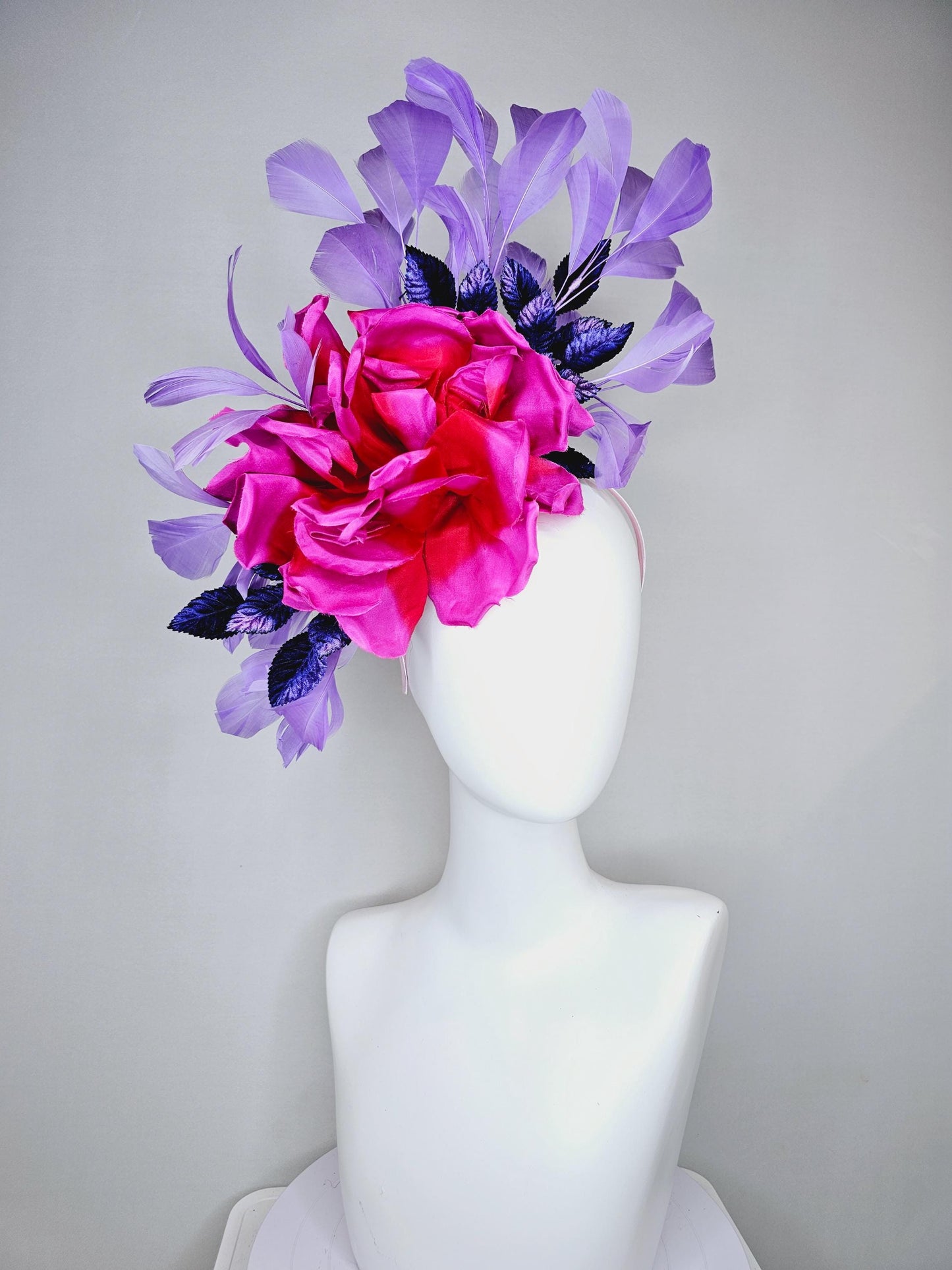 kentucky derby hat fascinator bright pink fuchsia red satin silk flower, purple violet satin leaves and purple lavender branching feathers