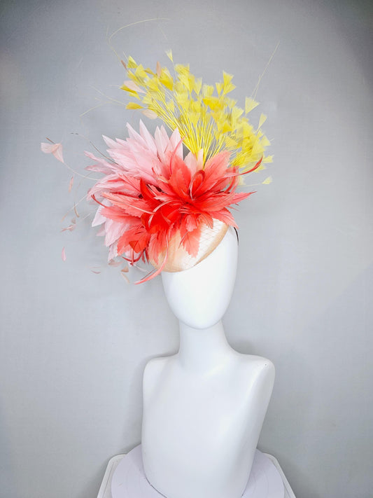 kentucky derby hat fascinator champagne satin with netting, coral orange and light blush baby pink feather flower, yellow branching feathers