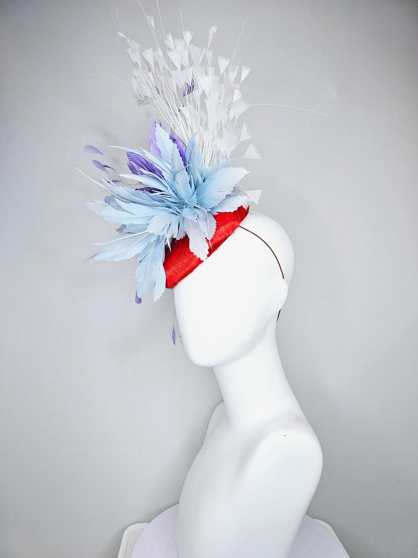 kentucky derby hat fascinator red satin with netting, light teal baby blue and purple lavender feather flower, white branching feathers