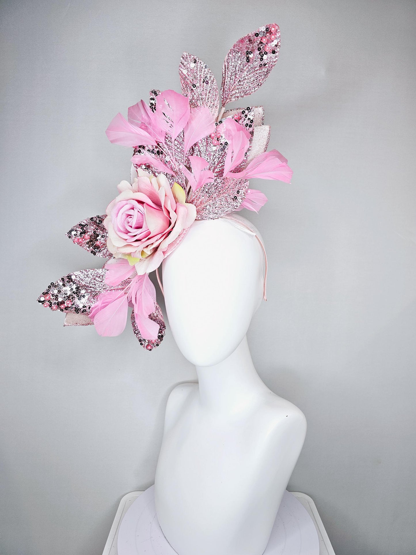 kentucky derby hat fascinator baby pink satin silk rose flower with metallic light pink sequin satin leaves and baby pink feathers