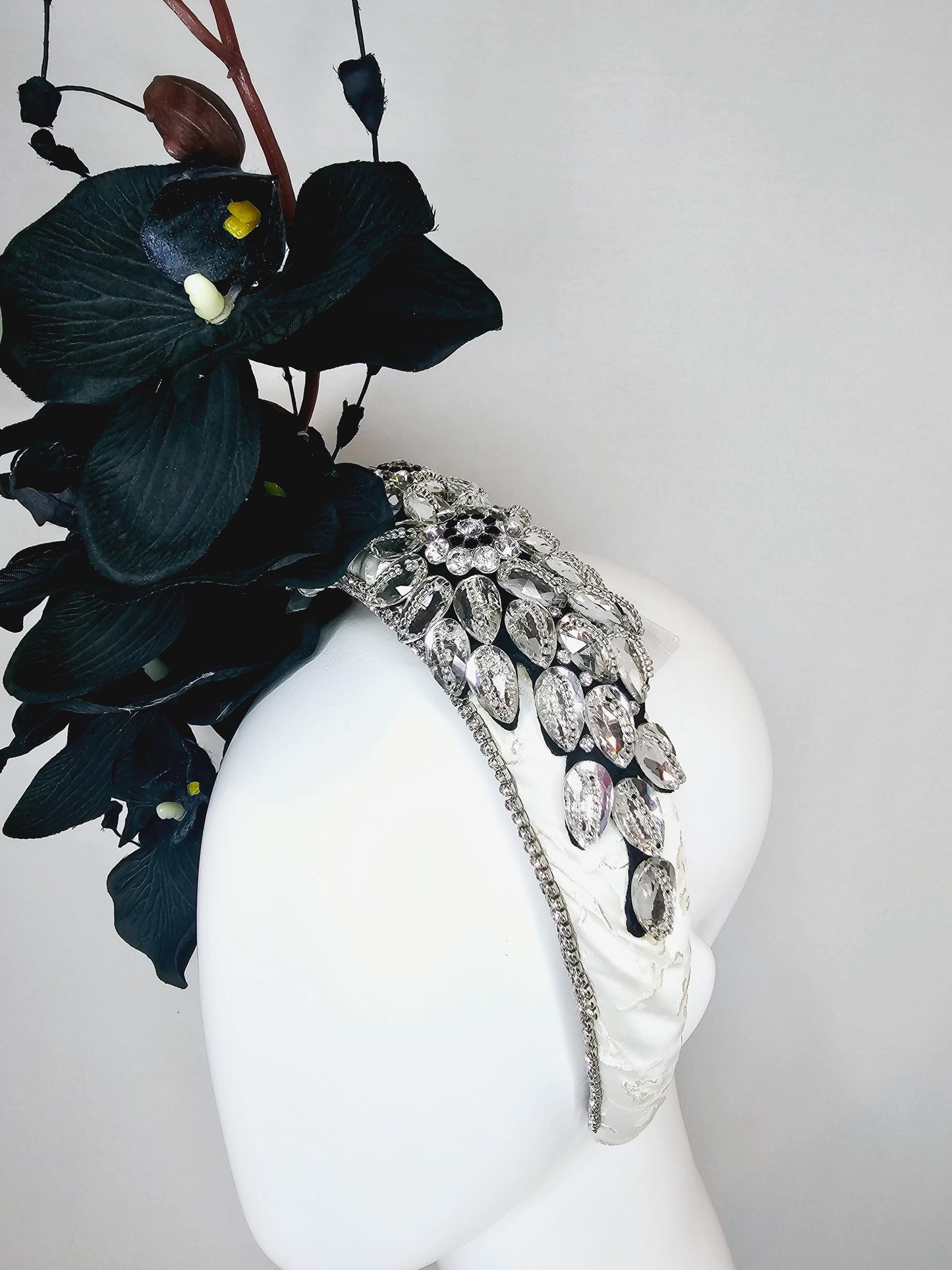 kentucky derby hat fascinator neutral crystal rhinestone jewel beaded on white headband with black satin orchid flowers and black stems