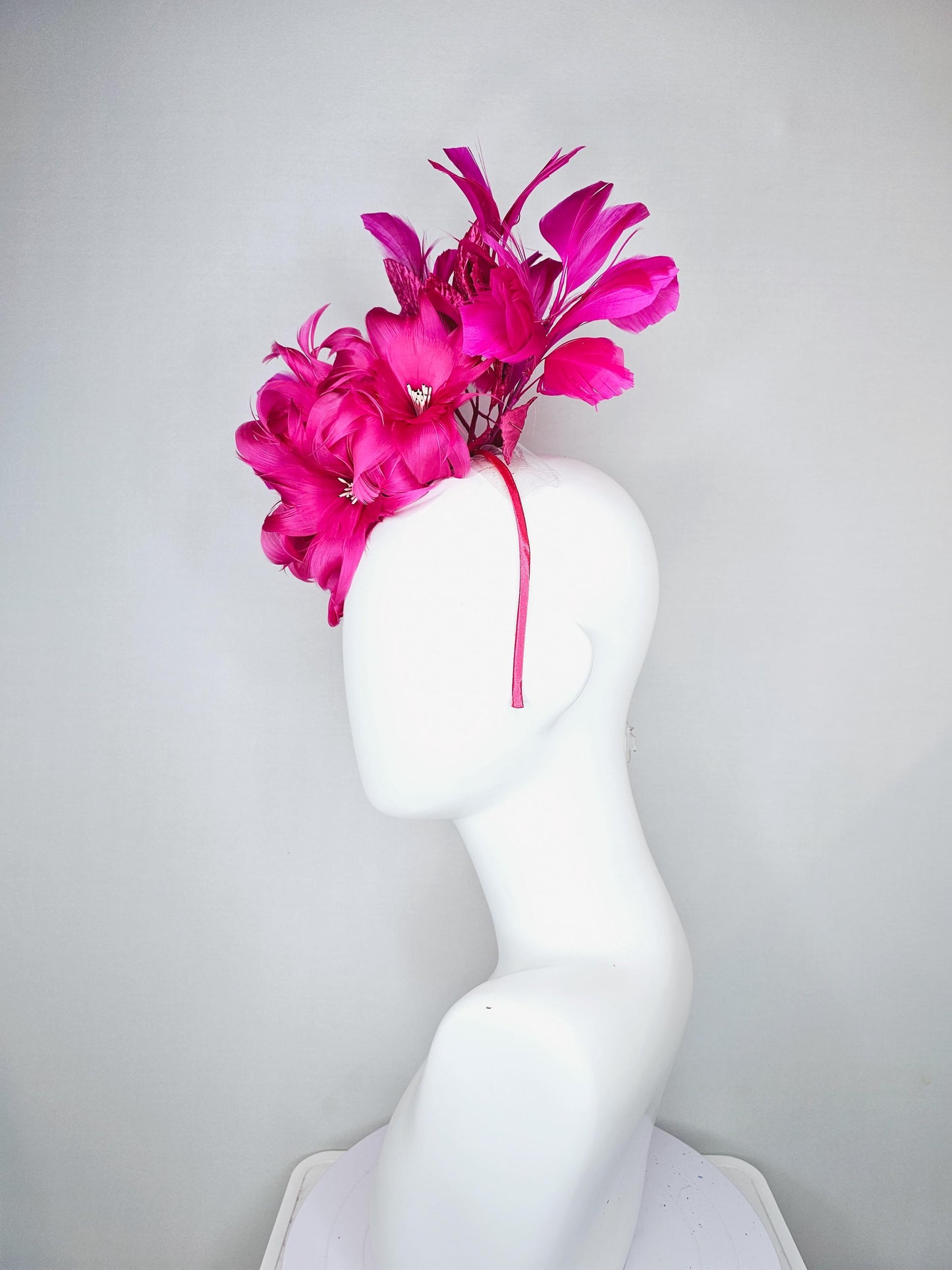 kentucky derby hat fascinator bright hot pink feather flowers with bright pink leaves and fuchsia pink feathers, thin headband