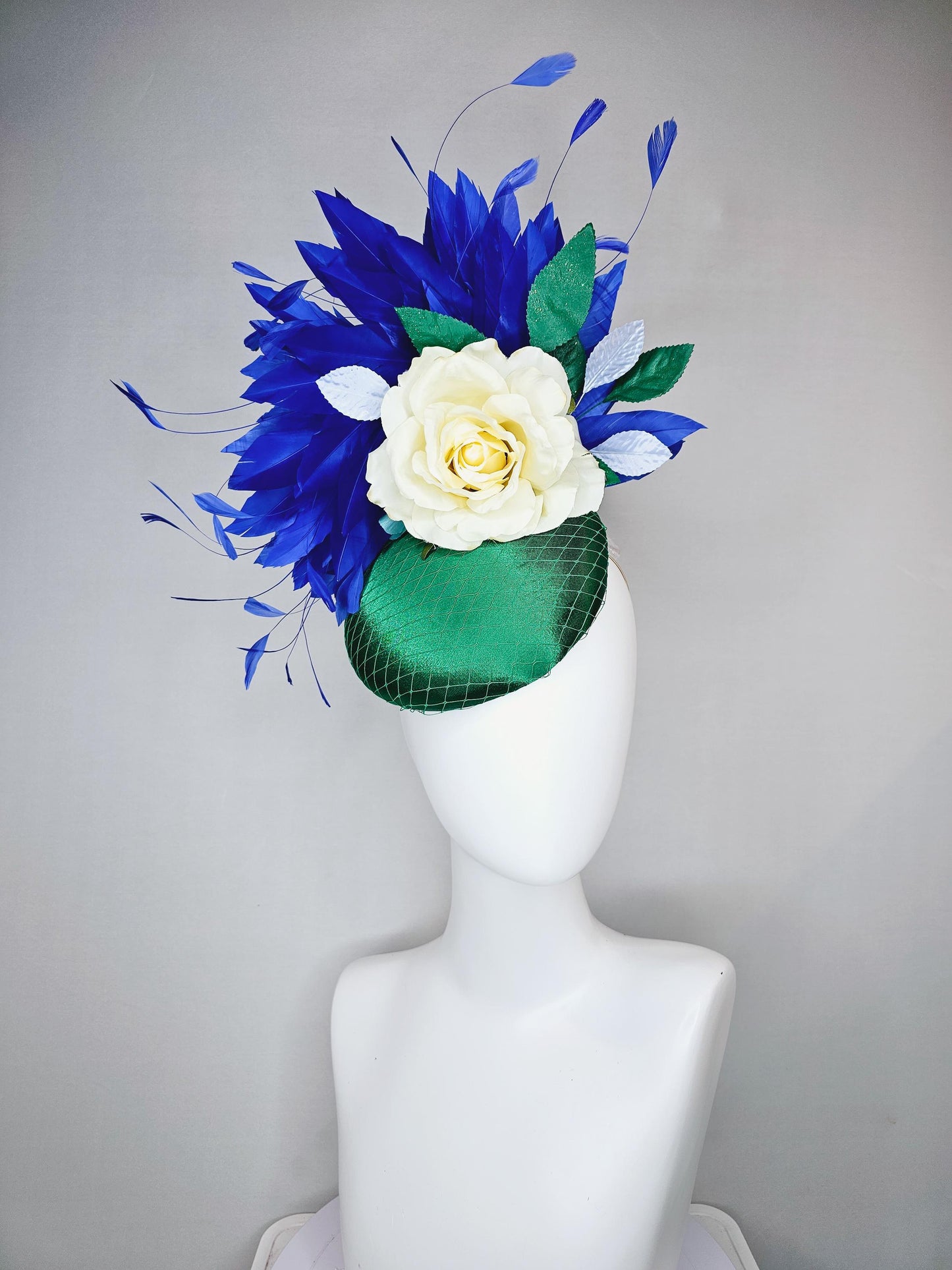 kentucky derby hat fascinator green satin with netting,white ivory satin rose flower,green leaves,royal cobalt blue branching feathers