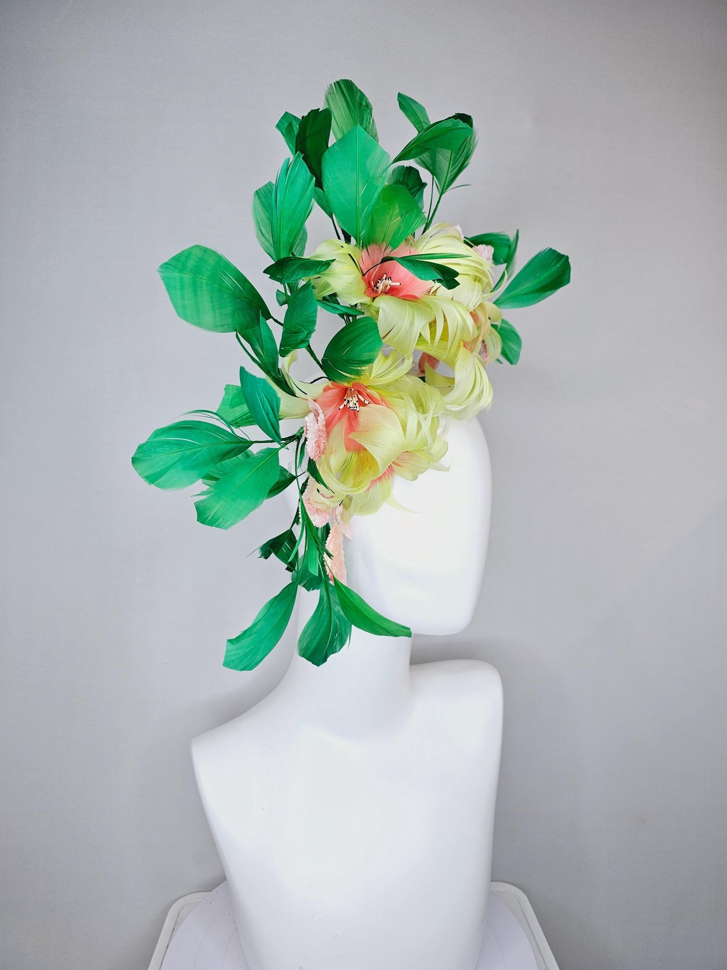 kentucky derby hat fascinator yellow feather flowers with ombre peach leaves and green feathers, thin headband