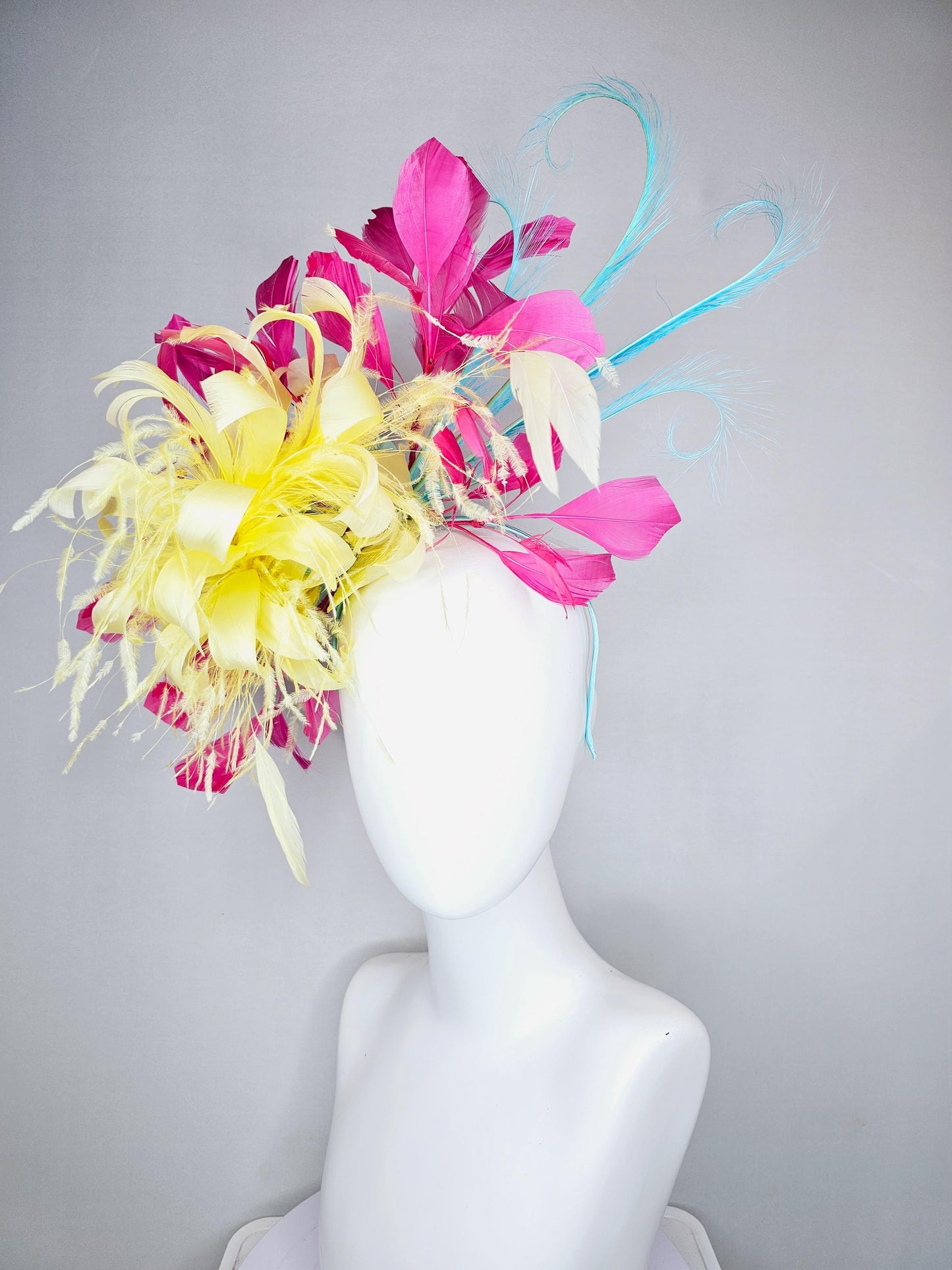 kentucky derby hat fascinator yellow fluffy feather flower with pink feathers, blue feathers, thin headband