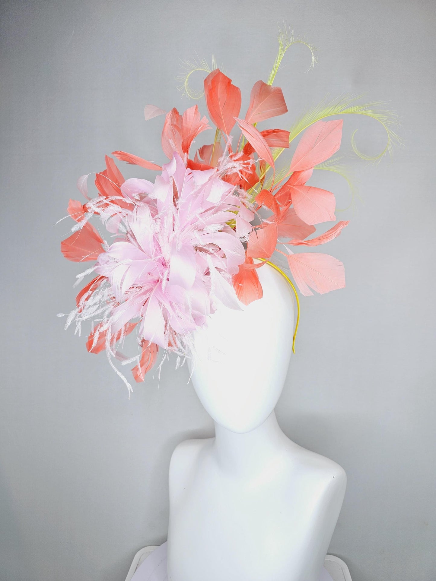 kentucky derby hat fascinator light pink fluffy feather flowers with coral orange feathers, yellow feathers, thin headband