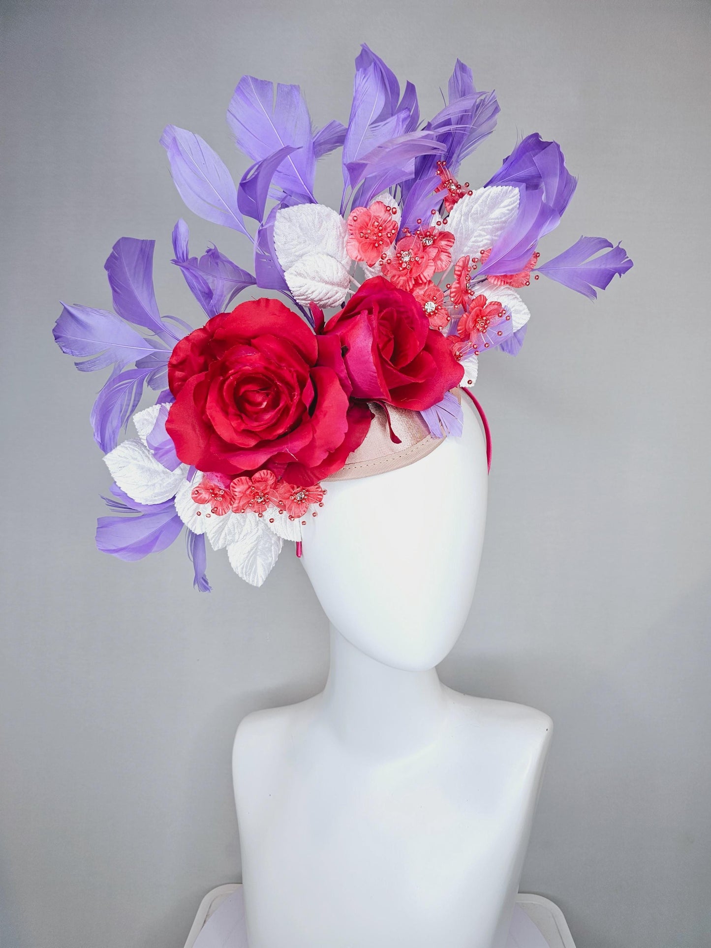 kentucky derby hat fascinator champagne satin,red satin rose flowers,small red coral flowers,white leaves,light purple lavender feathers