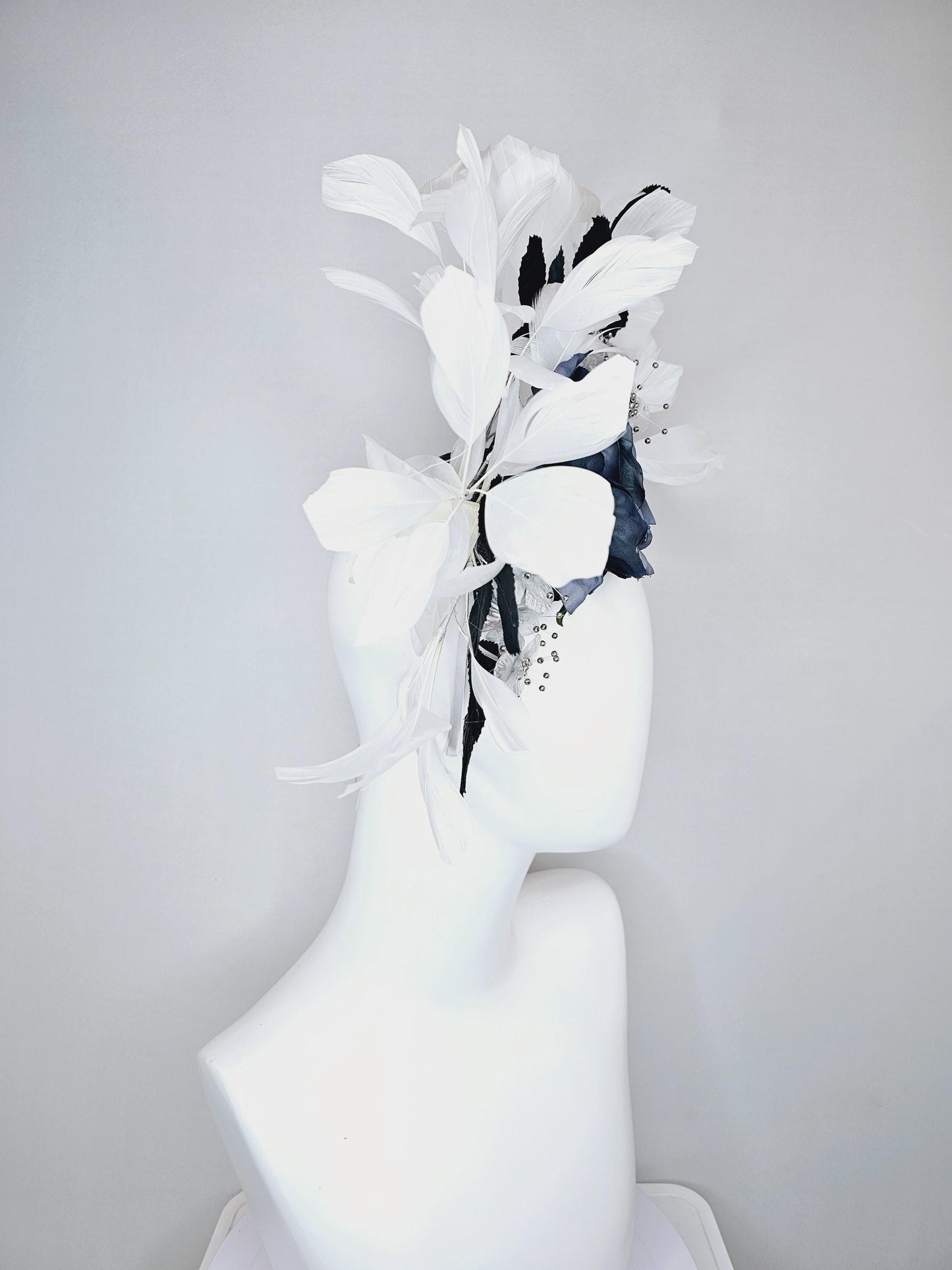 kentucky derby hat fascinator navy blue sinamay,ombre navy blue satin rose flower,small white silver flowers,navy blue leaves,white feathers