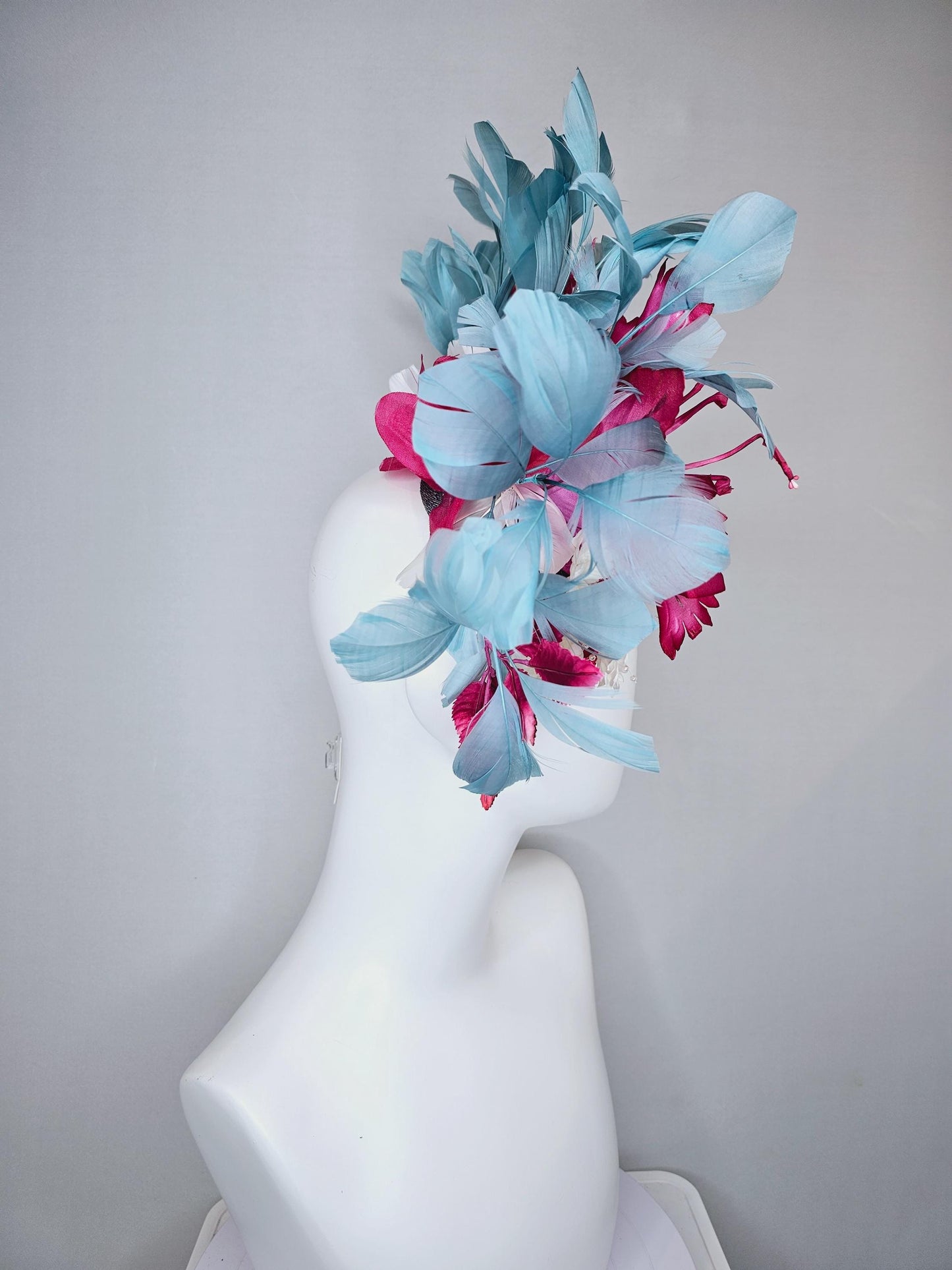 kentucky derby hat fascinator black sinamay,pink fuchsia satin flower,small white flowers with crystal pearl,pink leaves,teal blue feathers