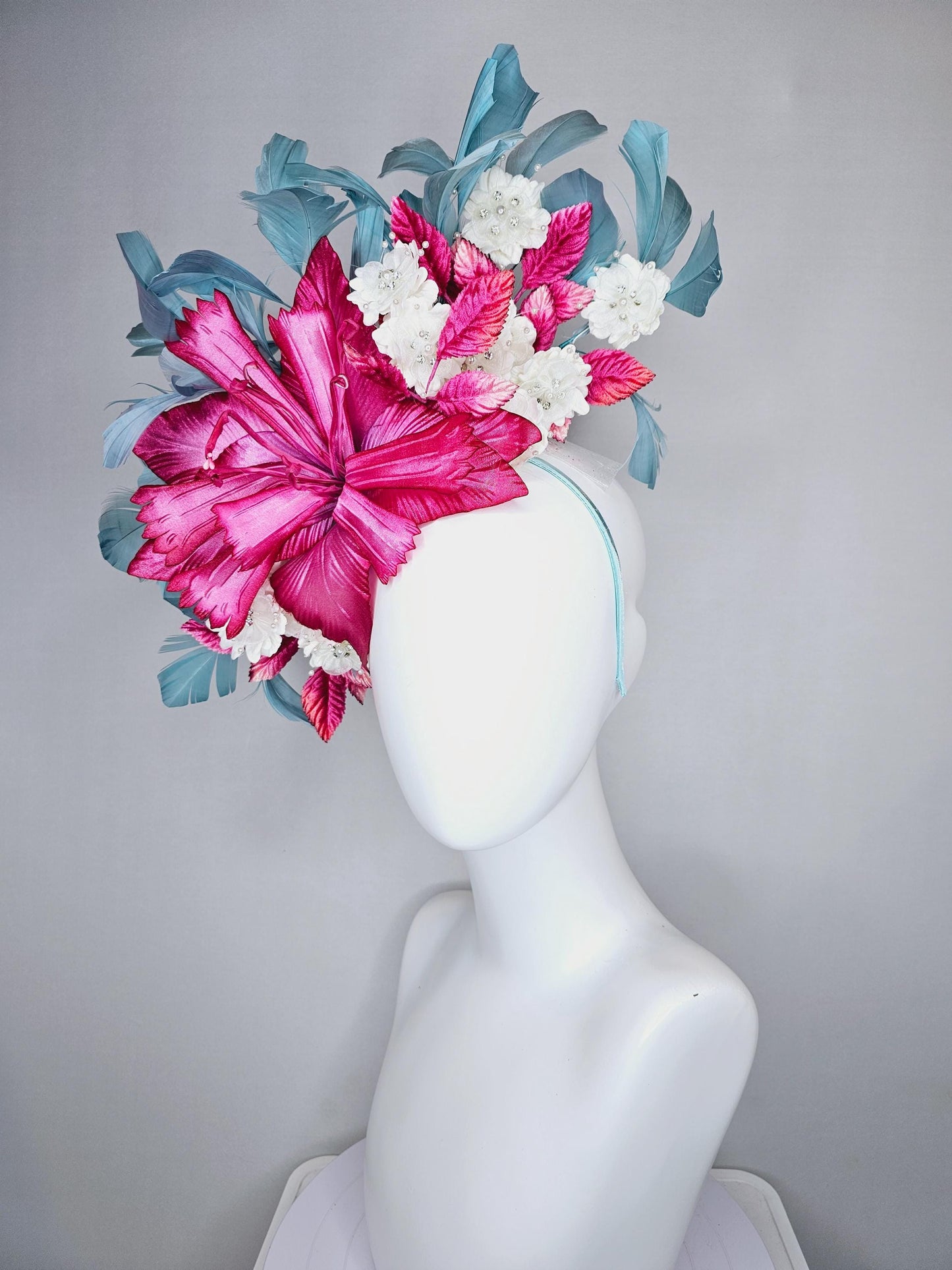 kentucky derby hat fascinator black sinamay,pink fuchsia satin flower,small white flowers with crystal pearl,pink leaves,teal blue feathers