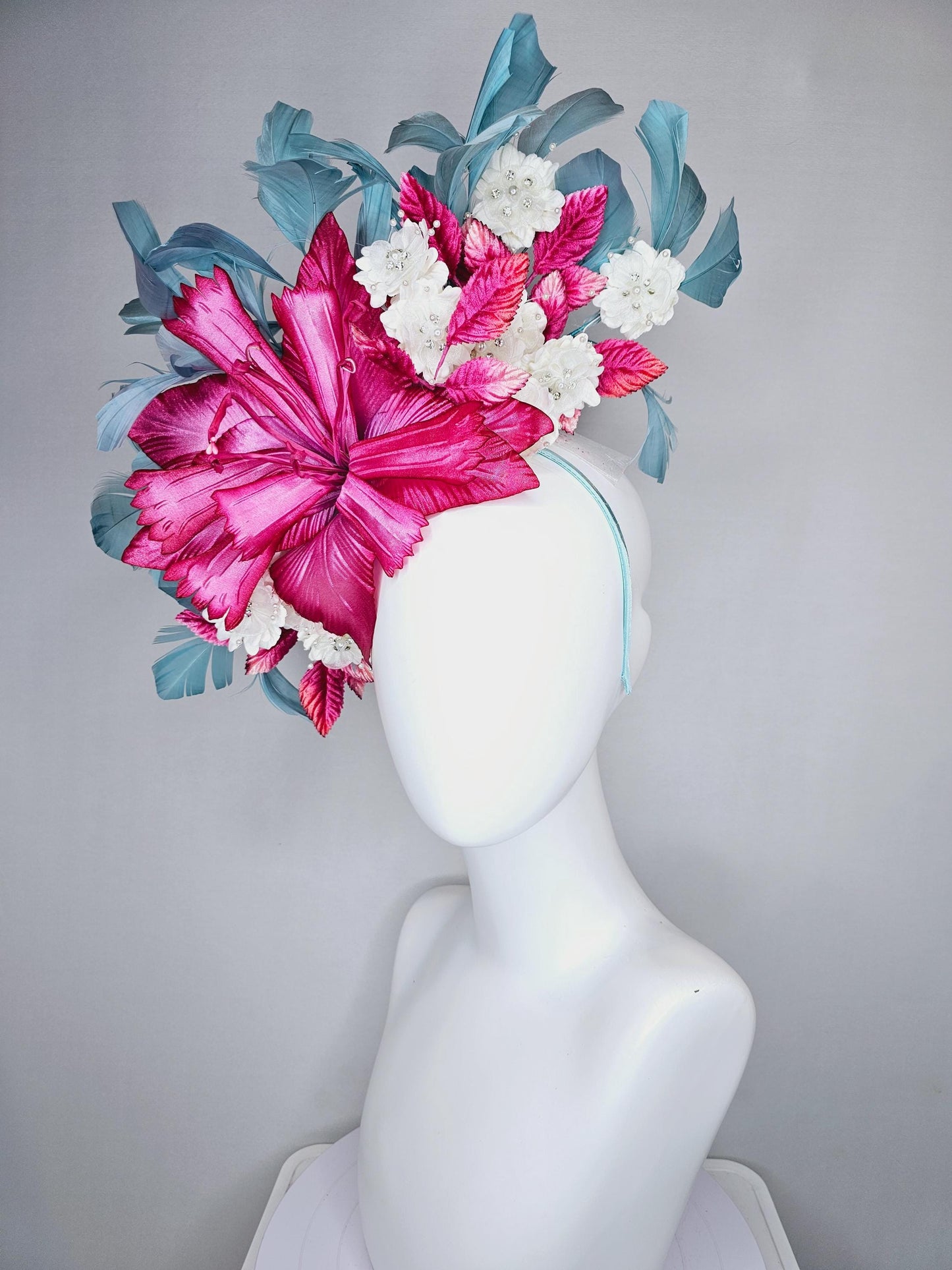 kentucky derby hat fascinator black sinamay,pink fuchsia satin flower,small white flowers with crystal pearl,pink leaves,teal blue feathers