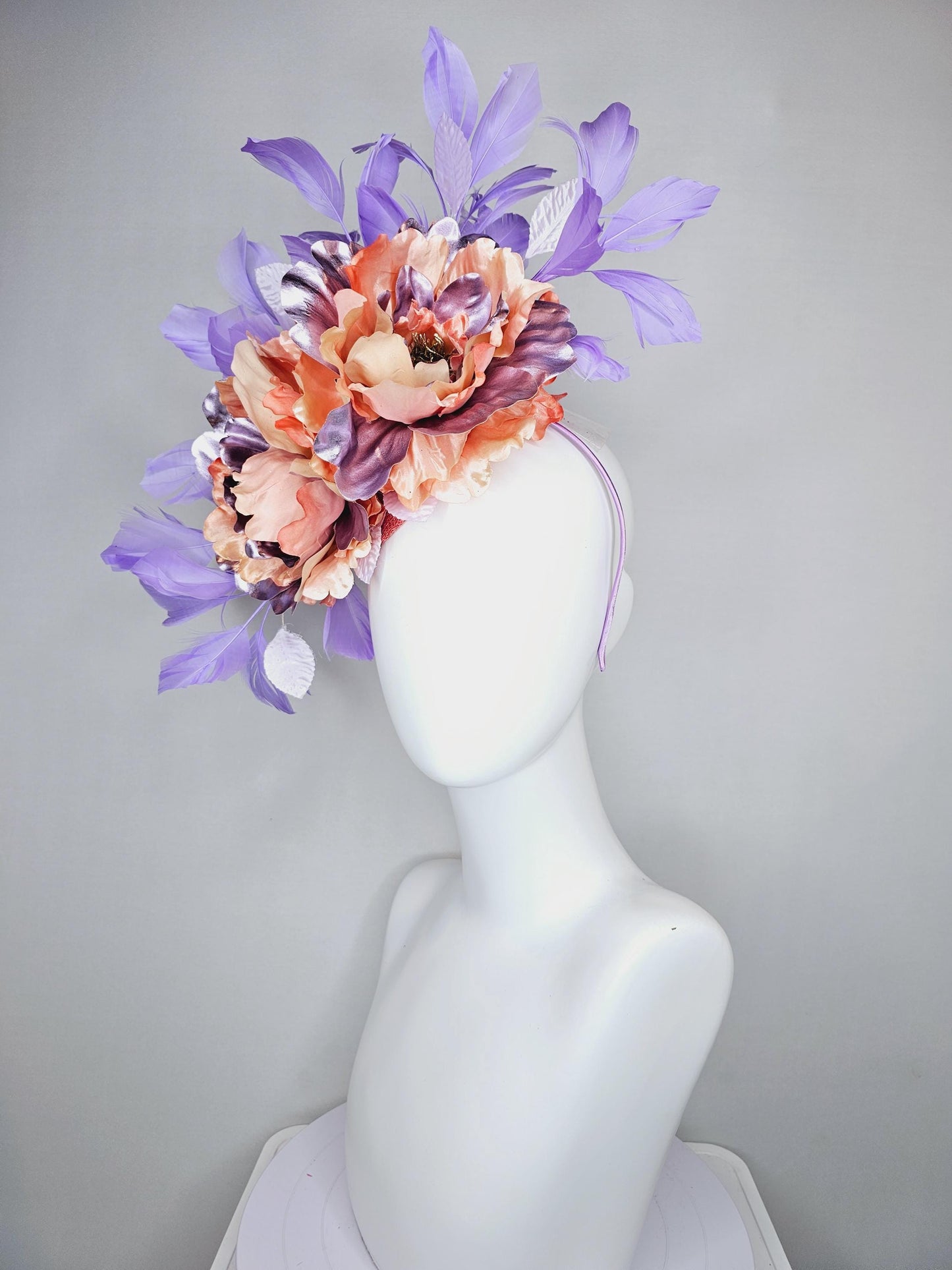 kentucky derby hat fascinator peach sinamay,coral peach orange purple lavender satin flowers,light lavender leaves,purple lavender feathers