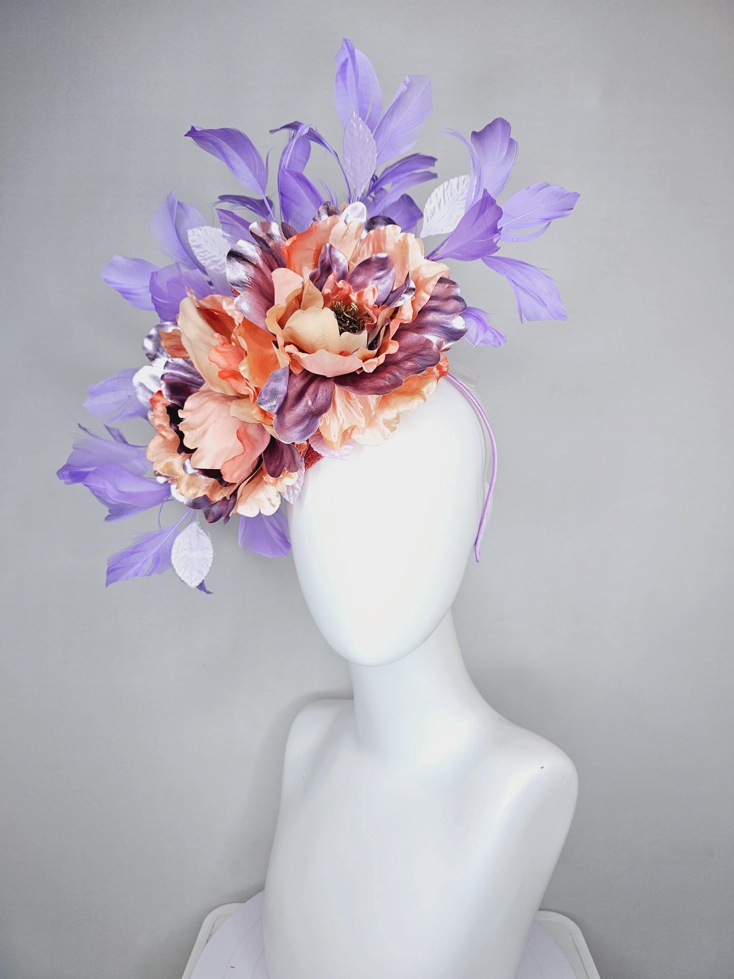 kentucky derby hat fascinator peach sinamay,coral peach orange purple lavender satin flowers,light lavender leaves,purple lavender feathers