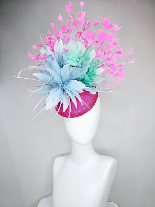 kentucky derby hat fascinator fuchsia pink sinamay with large fluffy light blue aqua blue feather flowers and blush pink branching feathers