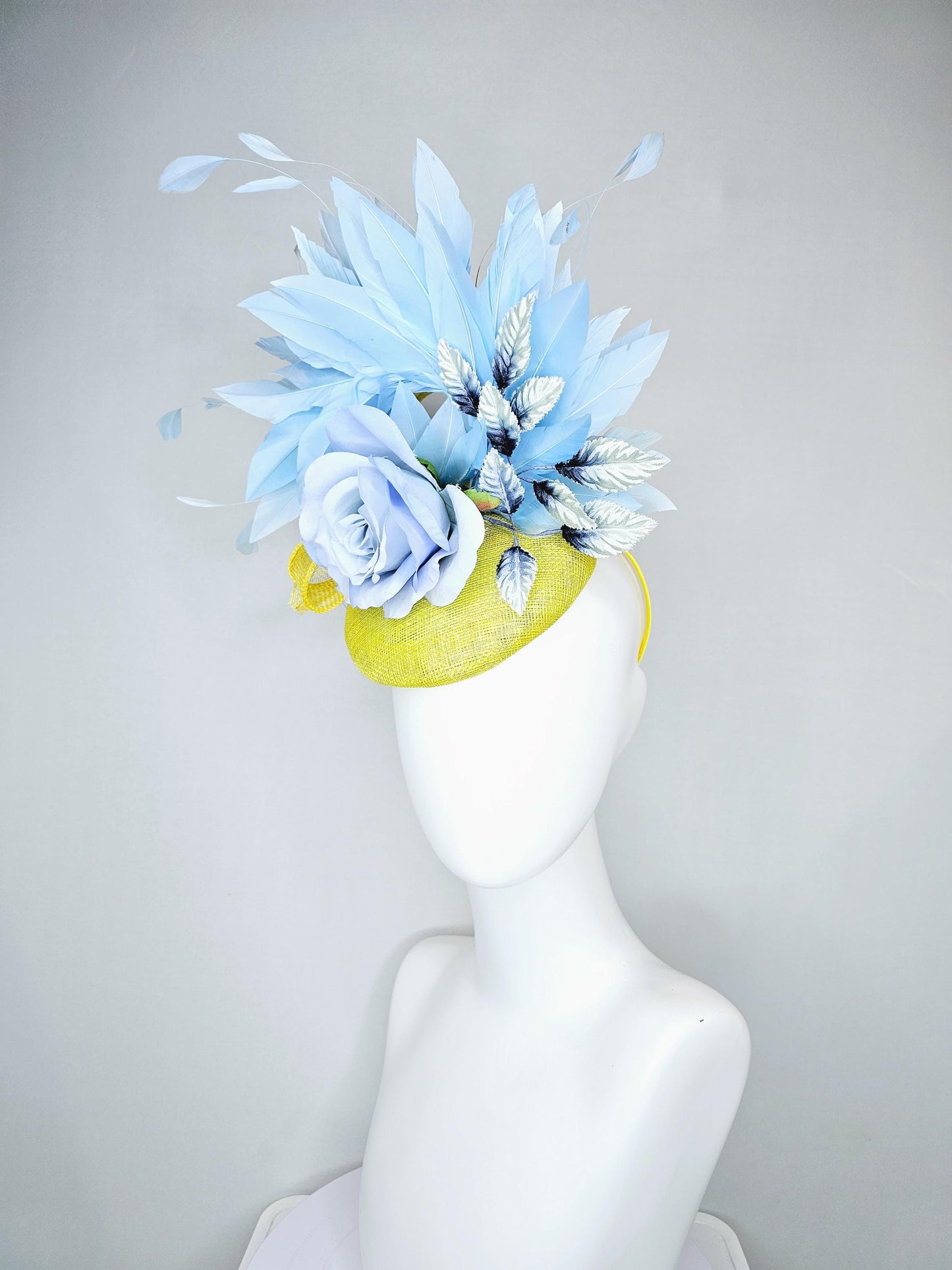 kentucky derby hat fascinator yellow sinamay, light baby blue satin rose flower, ombre navy blue leaves, sky blue branching feathers