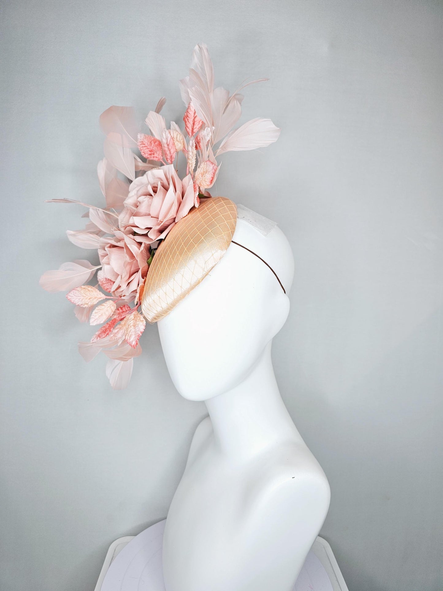 kentucky derby hat fascinator champagne satin with netting,light blush pink satin rose flowers,blush pink leaves,light blush pink feathers