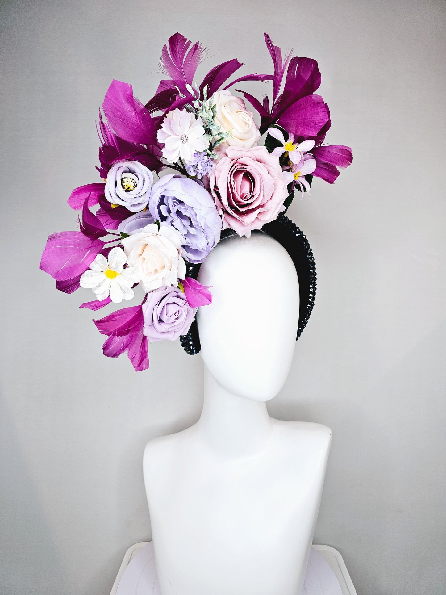 kentucky derby hat fascinator iridescent navy blue crystal headband,cream light pink purple lavender flowers,green leaves,magenta feathers