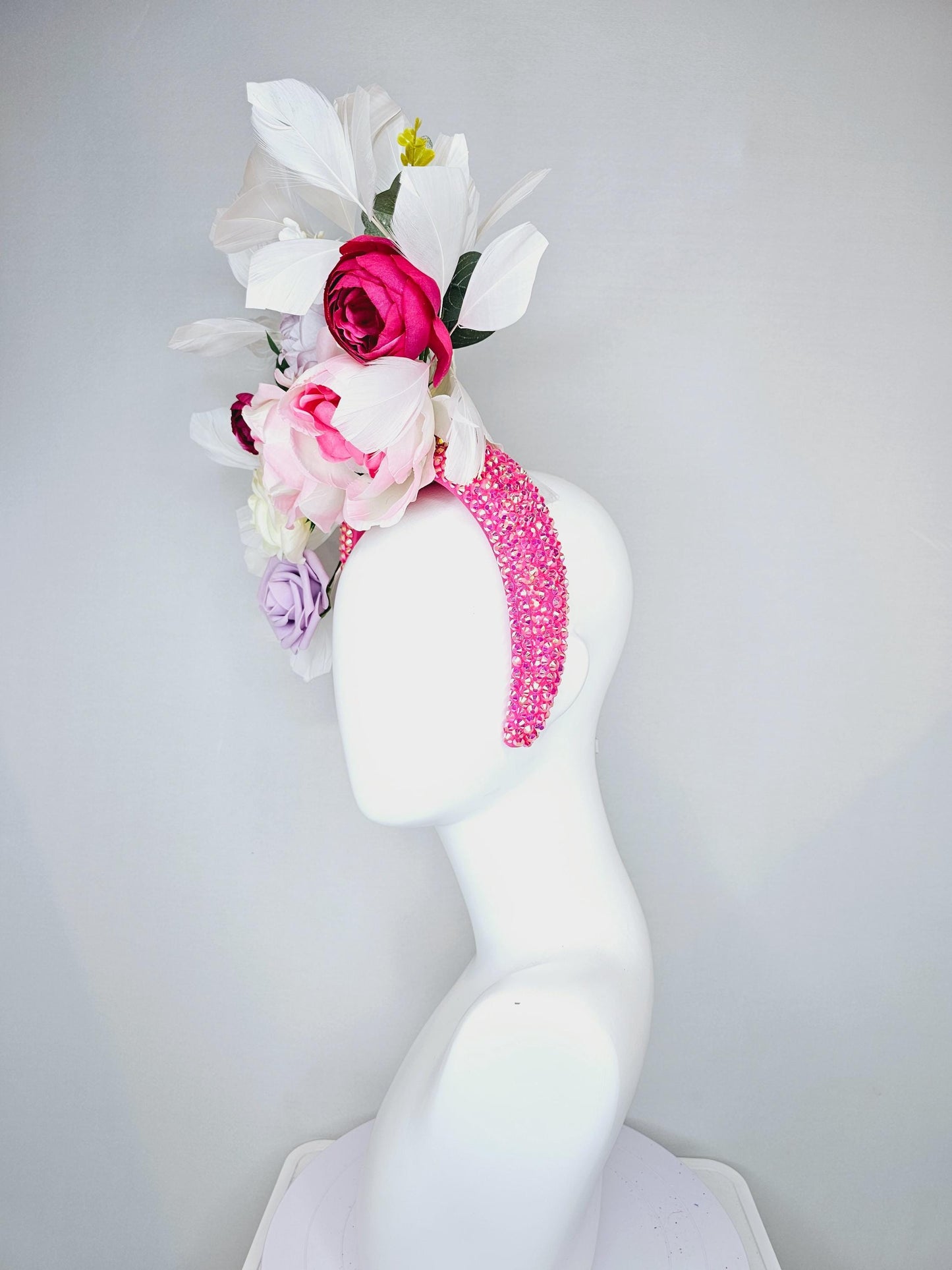 kentucky derby hat fascinator iridescent pink crystal headband,cream blush pink light purple pink rose flowers,green leaves,white feathers