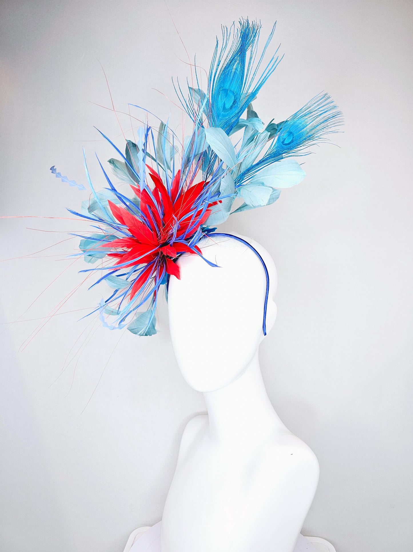 kentucky derby hat fascinator red royal blue feather flower,baby royal blue zigzag feathers, light teal blue and blue peacock feathers